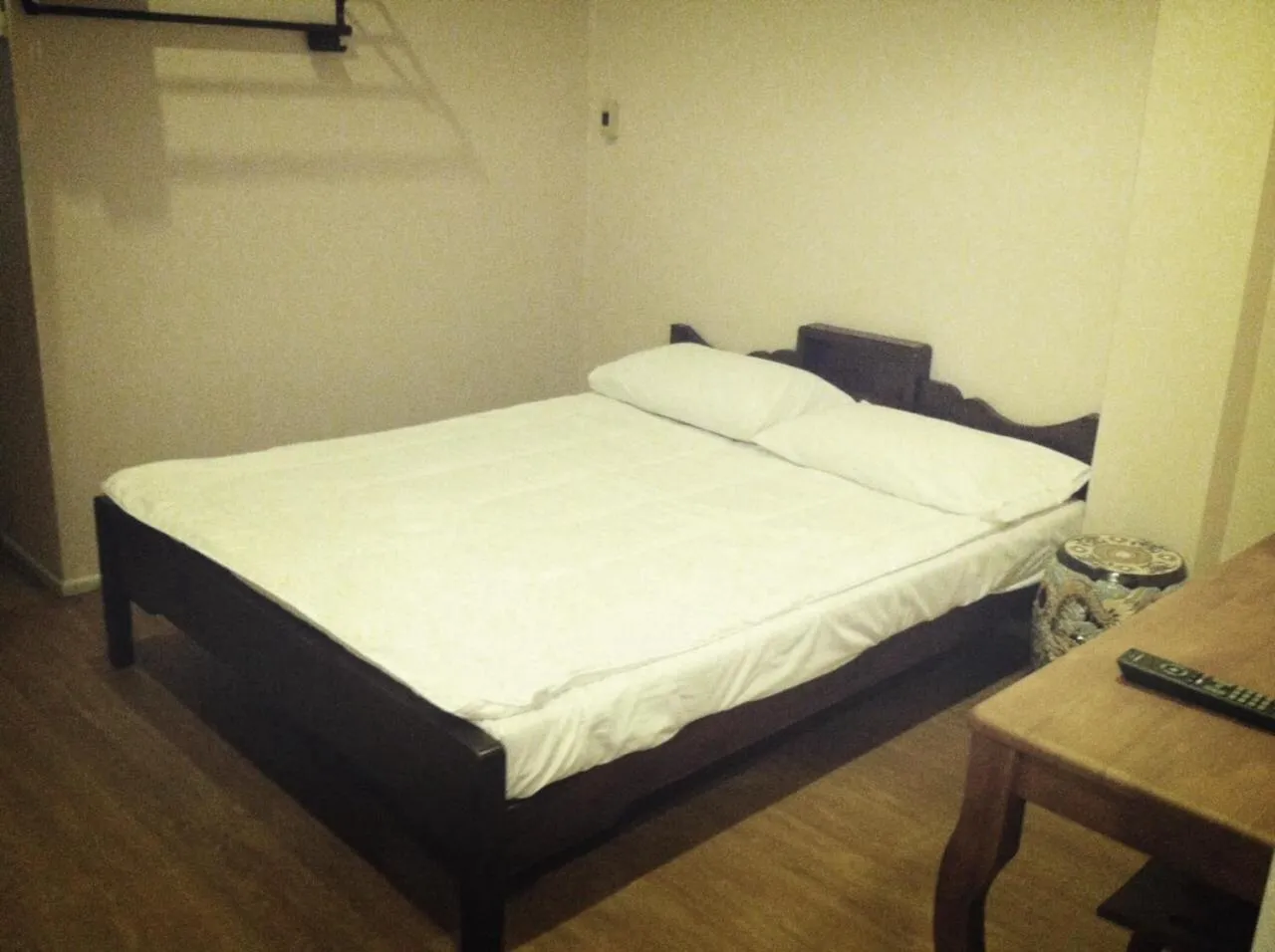 Bed in The Grand Palace Hotel