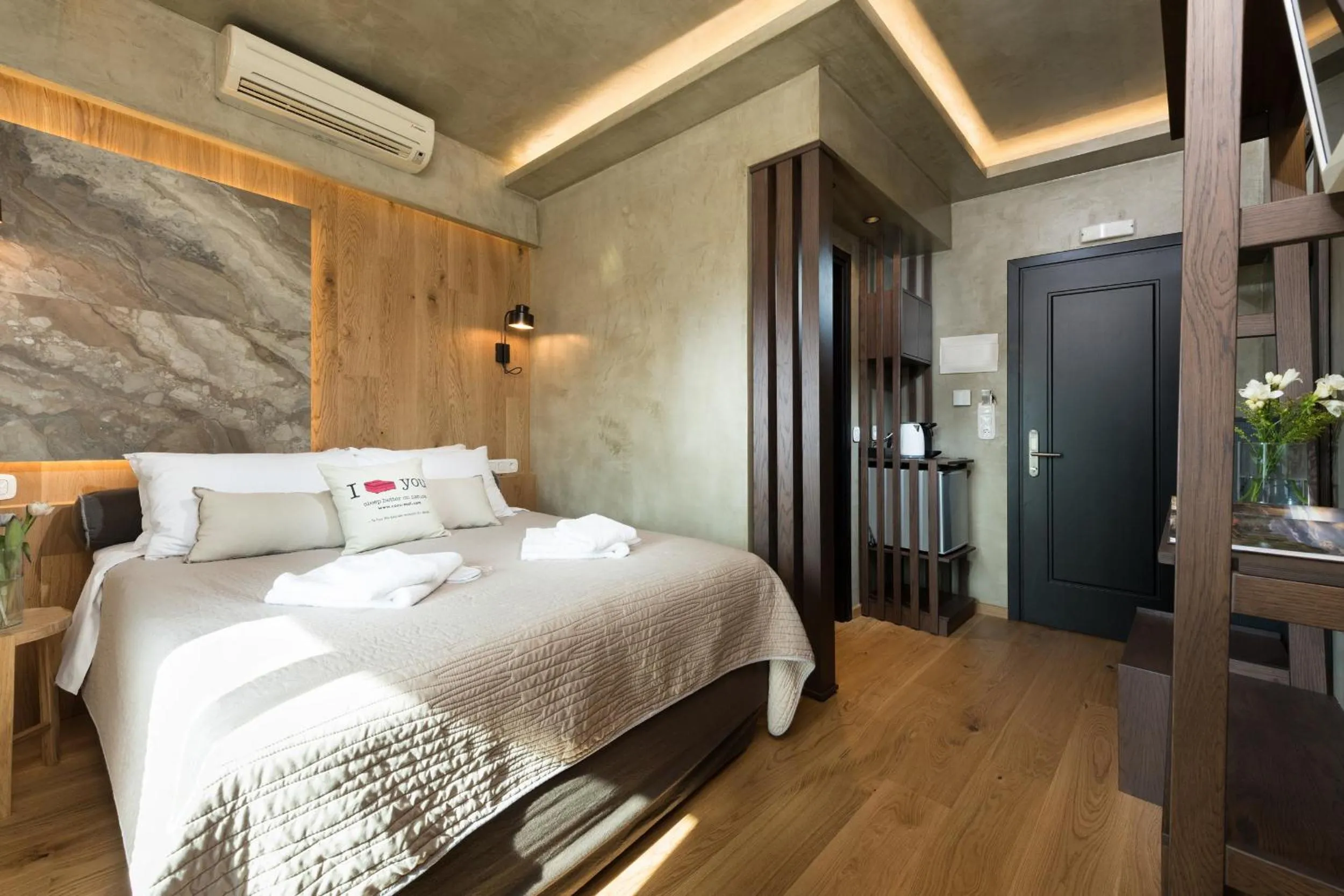 Bed in Tsikeli Boutique Hotel Meteora - Adults Friendly