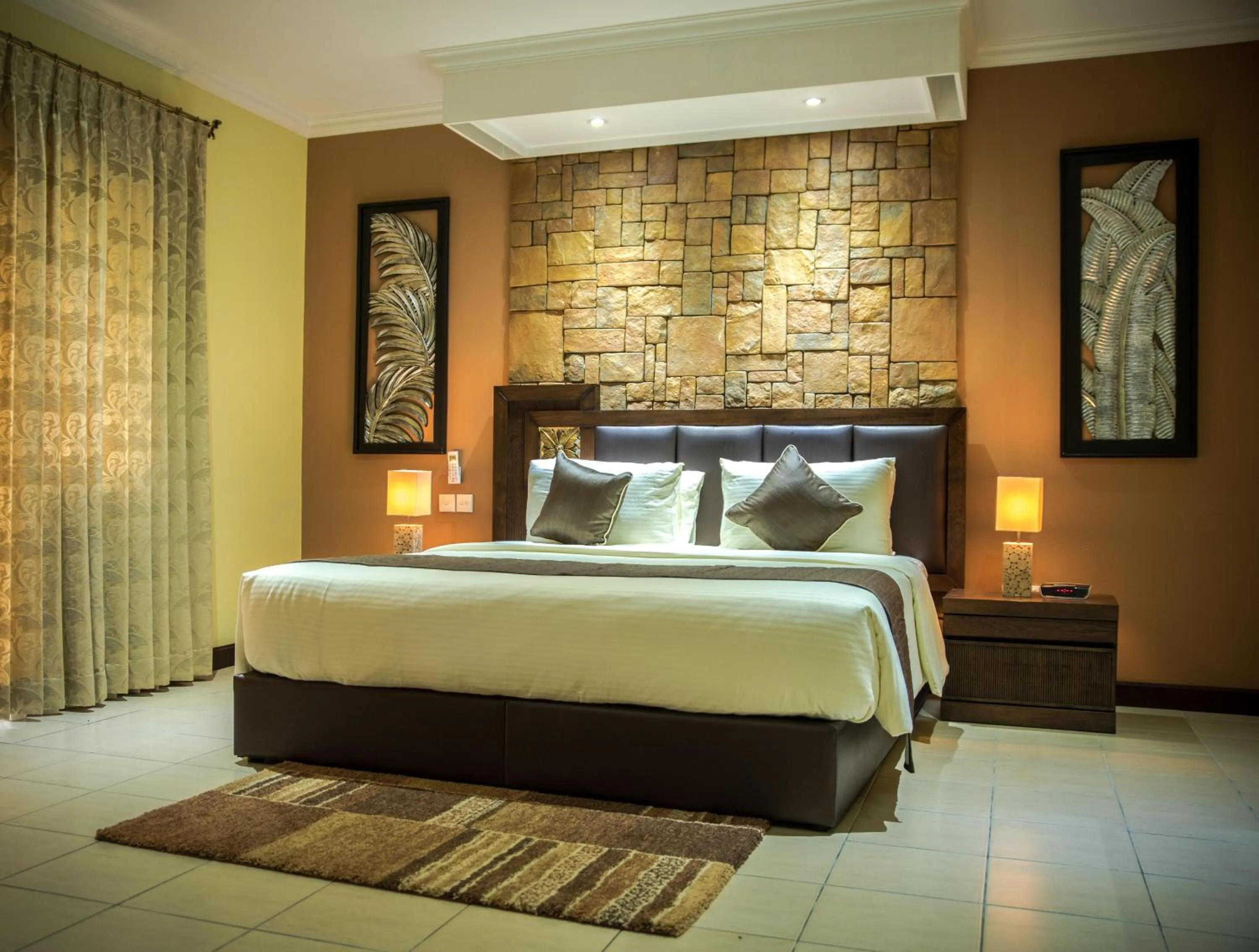 Bed in Oasis Hotel Restaurant & Spa