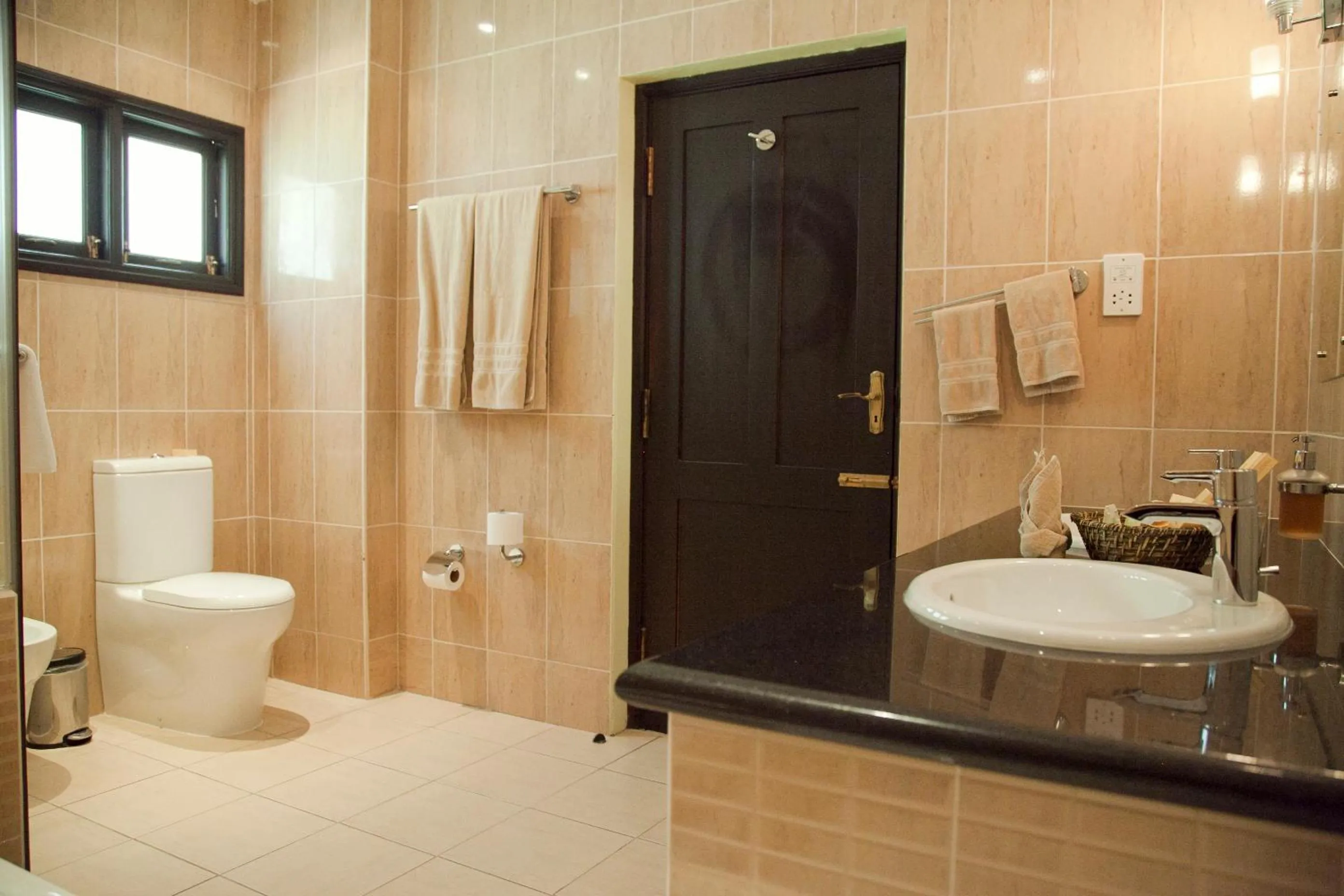 Bathroom in Oasis Hotel Restaurant & Spa