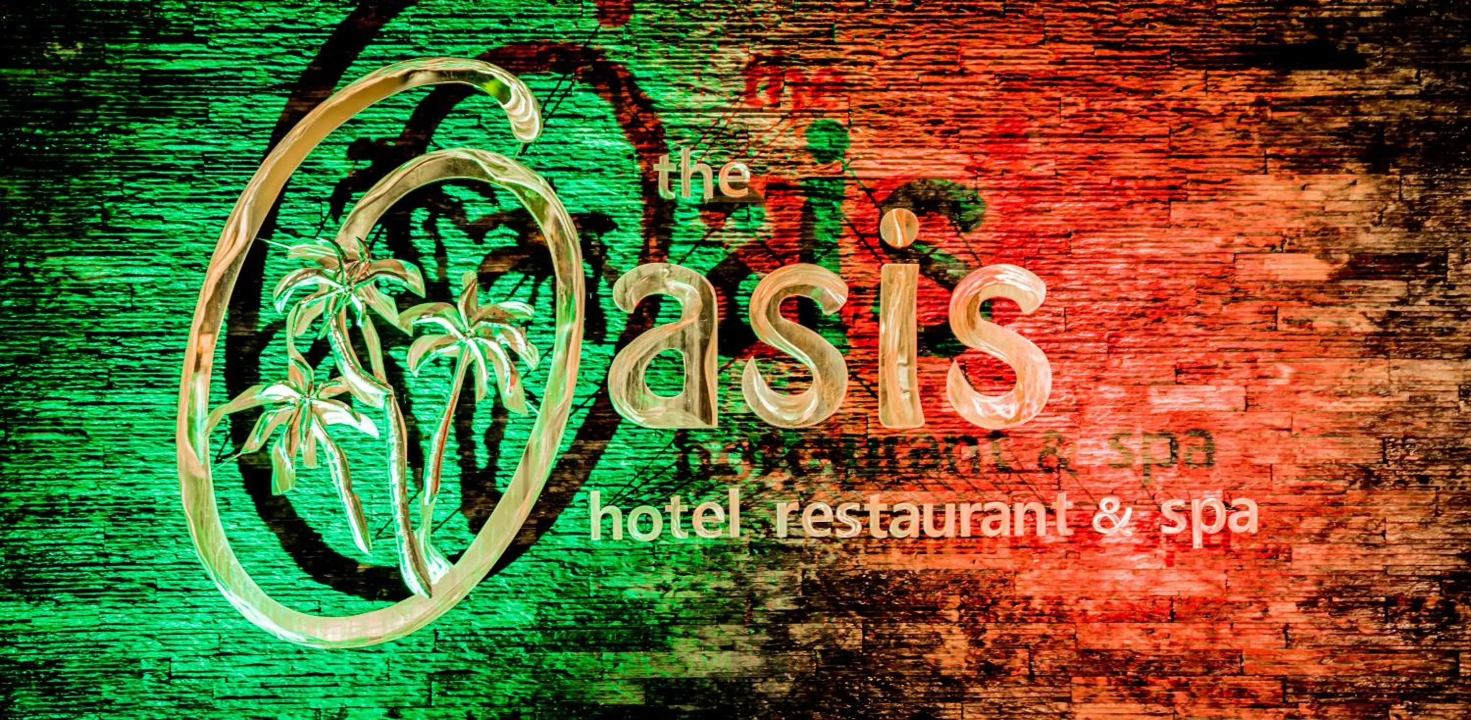 Property logo or sign in Oasis Hotel Restaurant & Spa