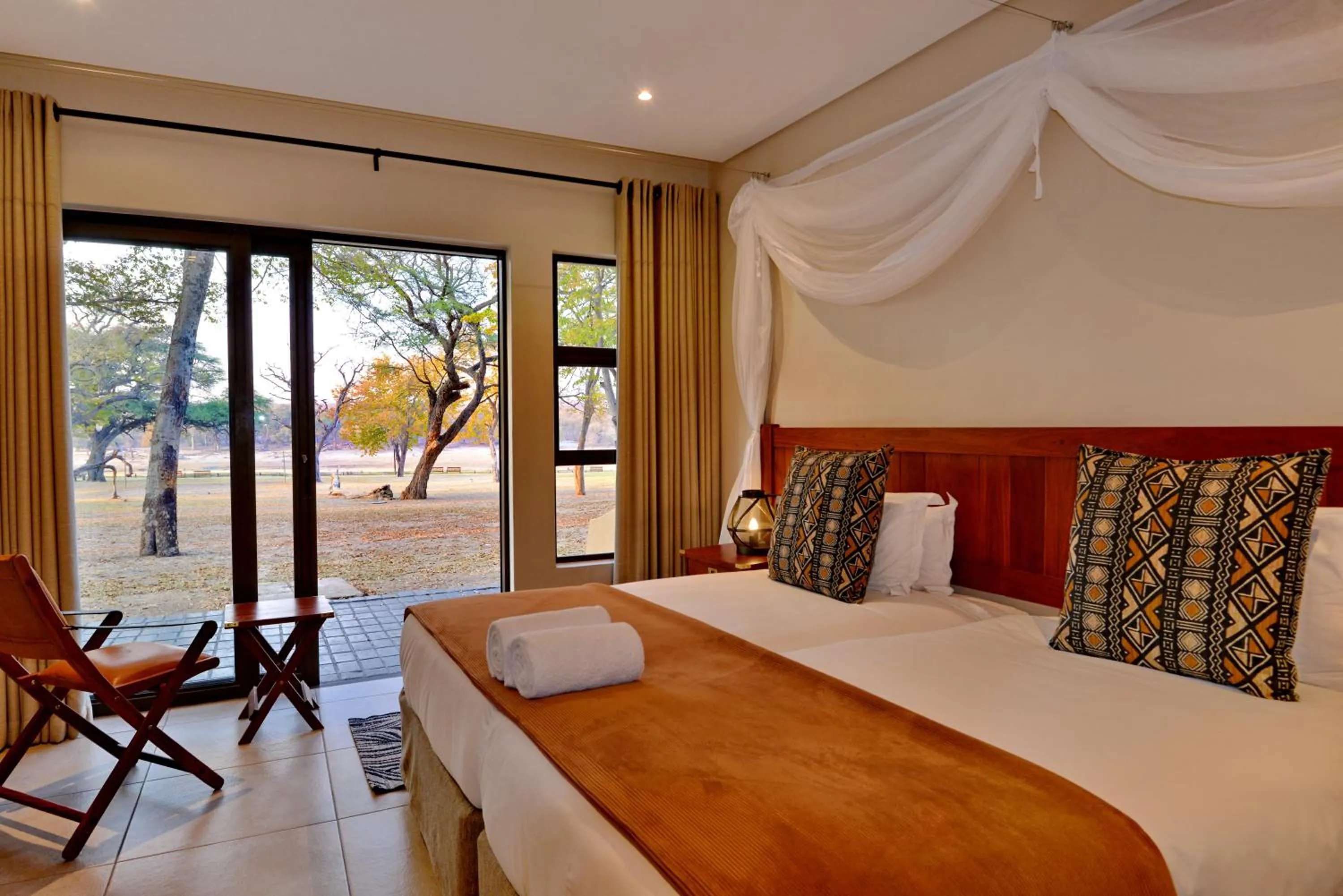 View (from property/room), Bed in Hwange Safari Lodge