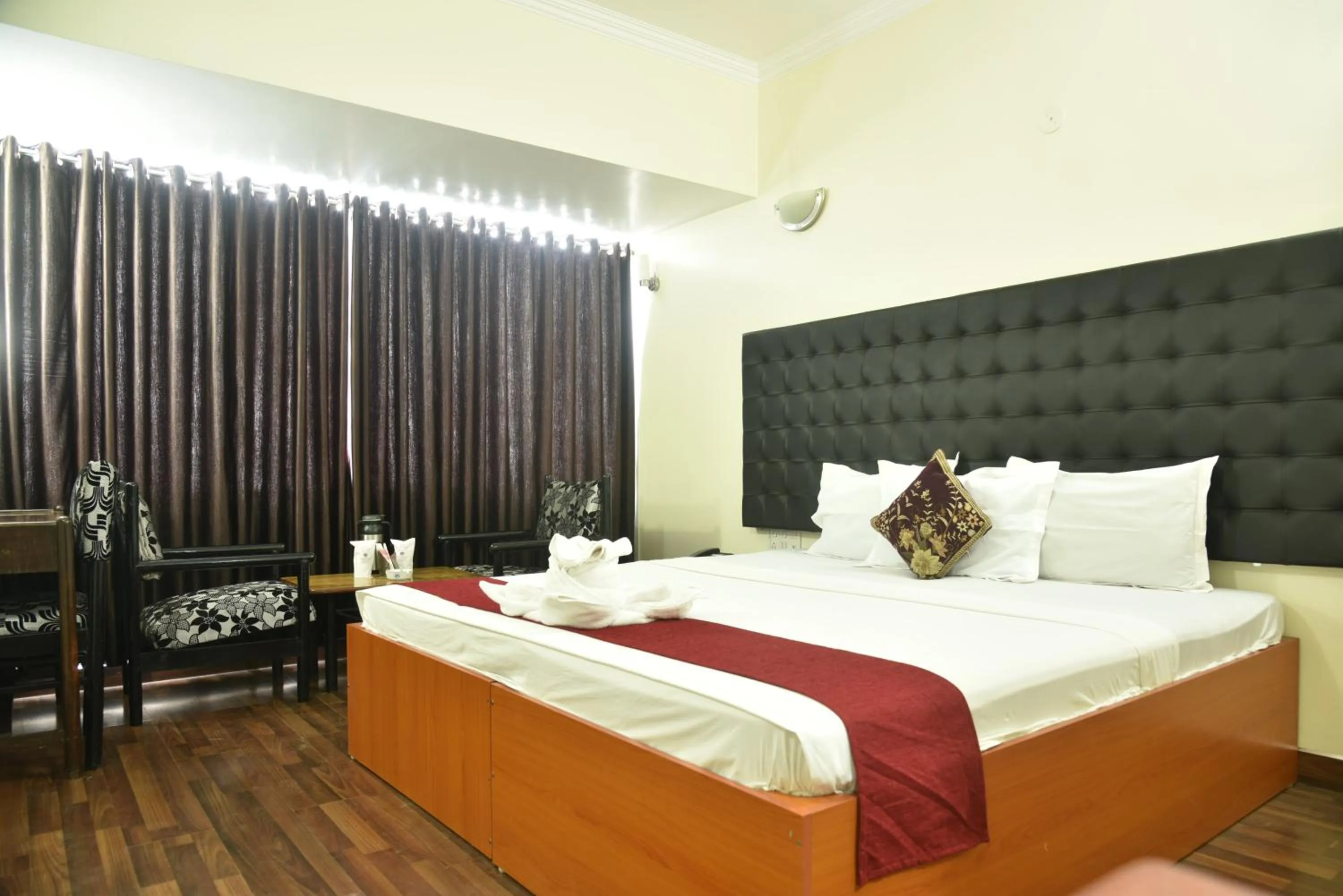 Bed in Hotel Rajhans International