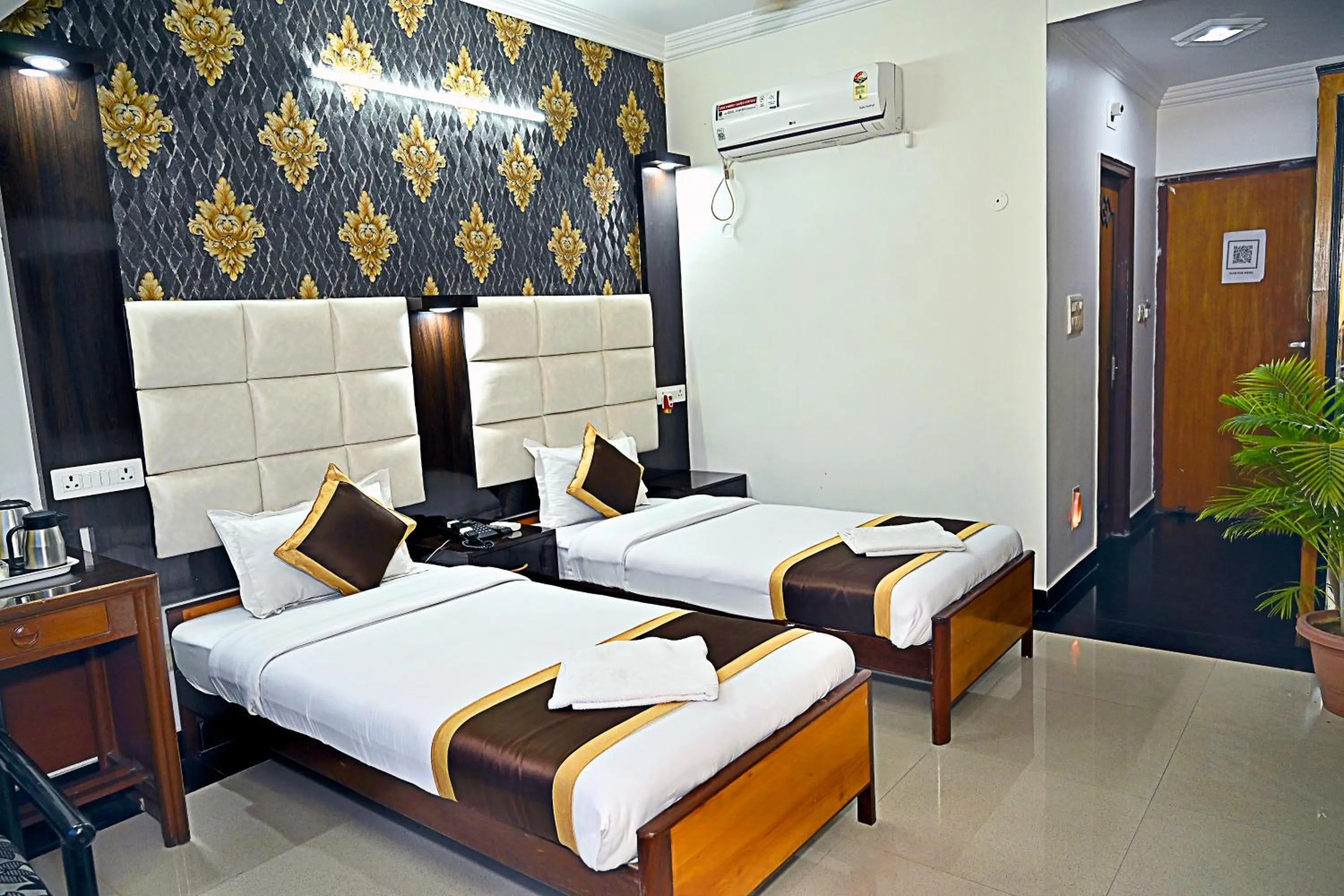 Bedroom in Hotel Rajhans International