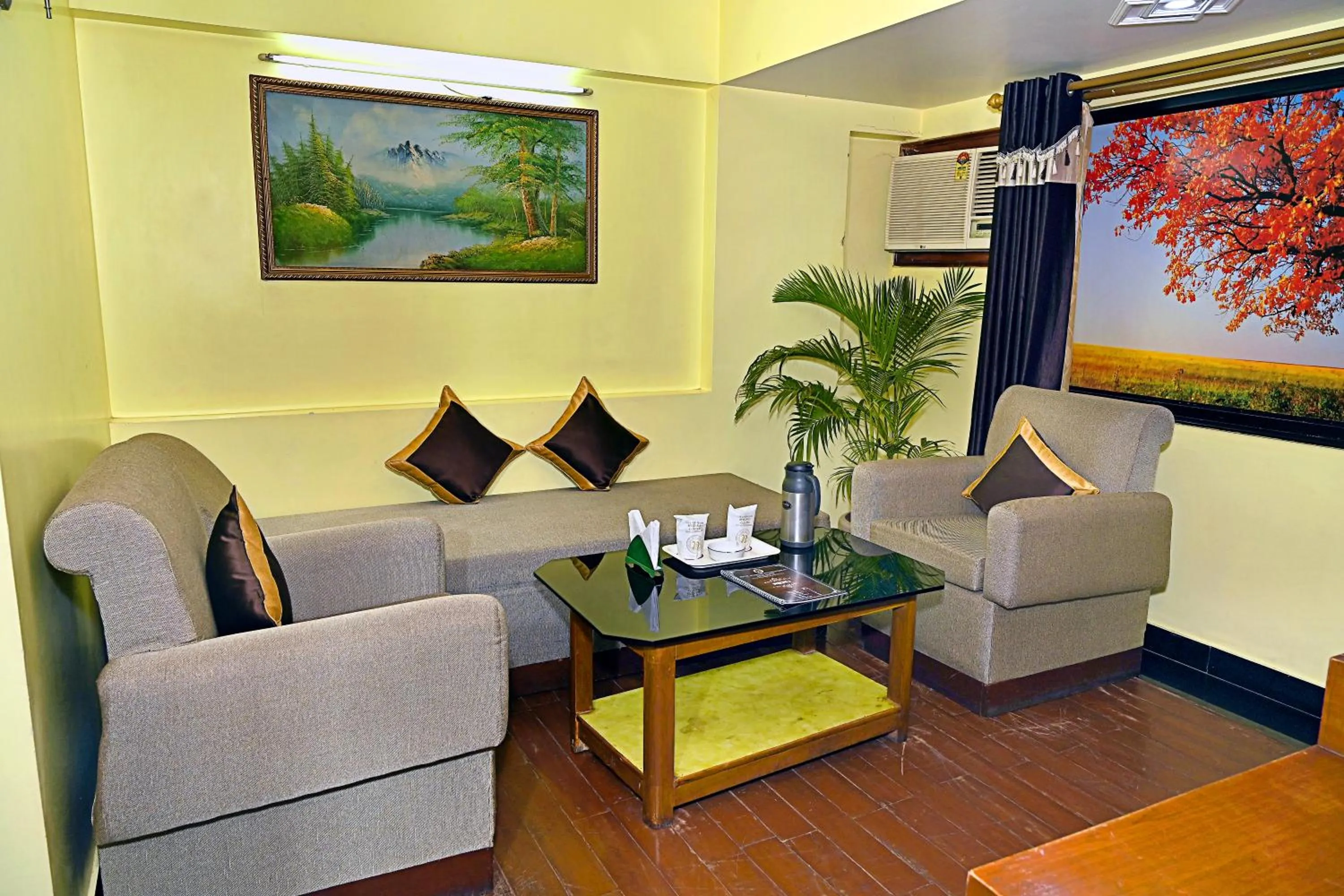 Seating area in Hotel Rajhans International