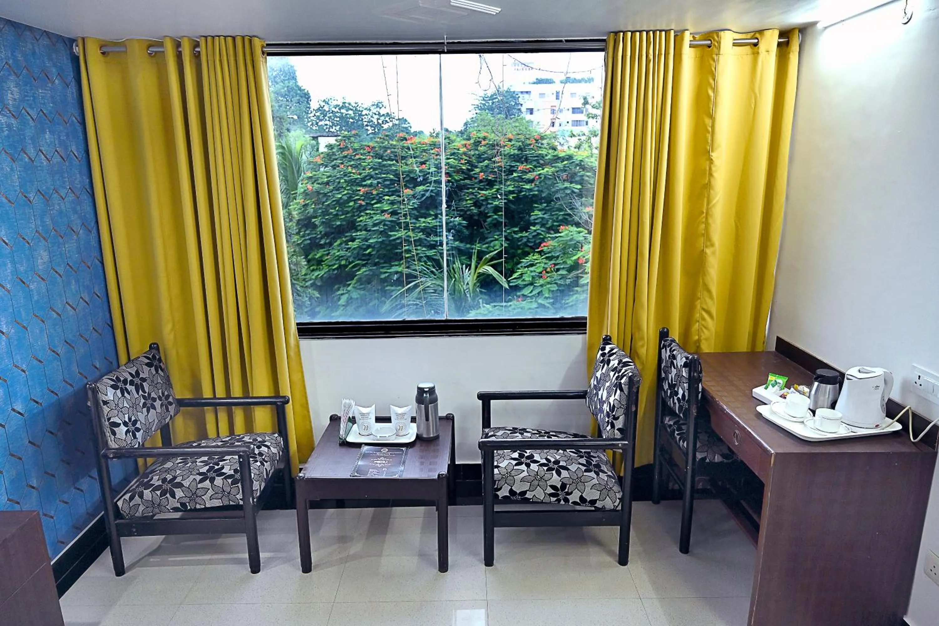 Seating area in Hotel Rajhans International