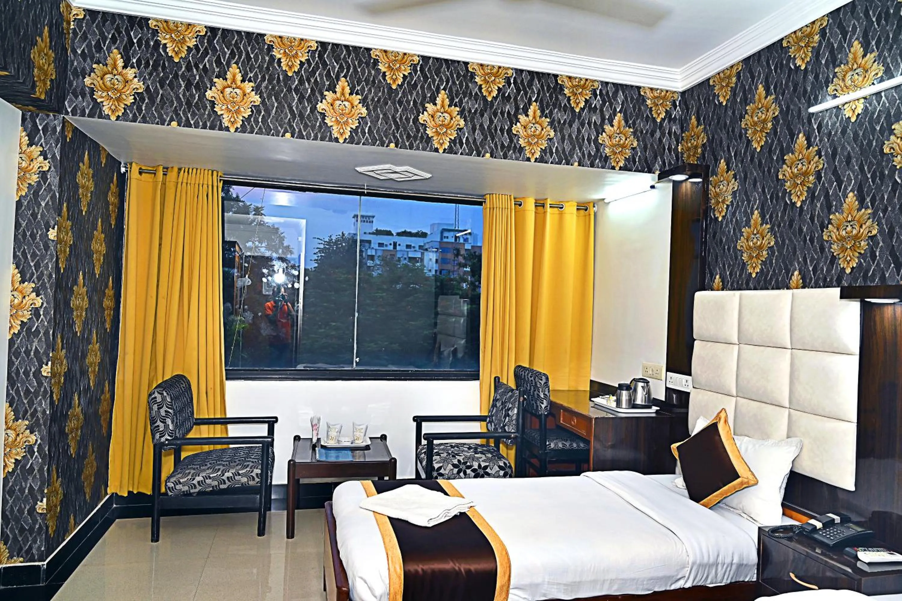 Photo of the whole room in Hotel Rajhans International