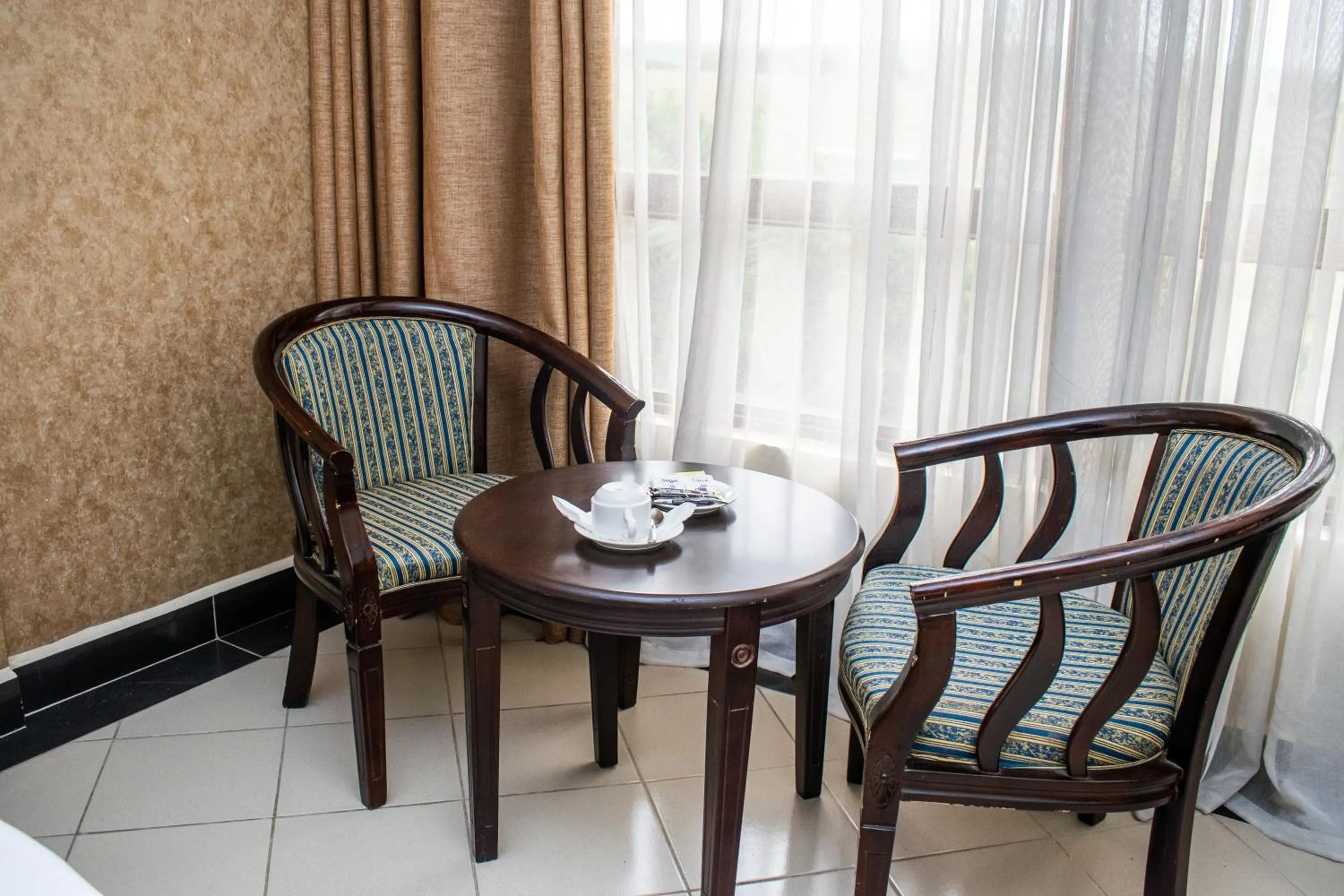Seating area in Astorian Grand Hotel Naivasha