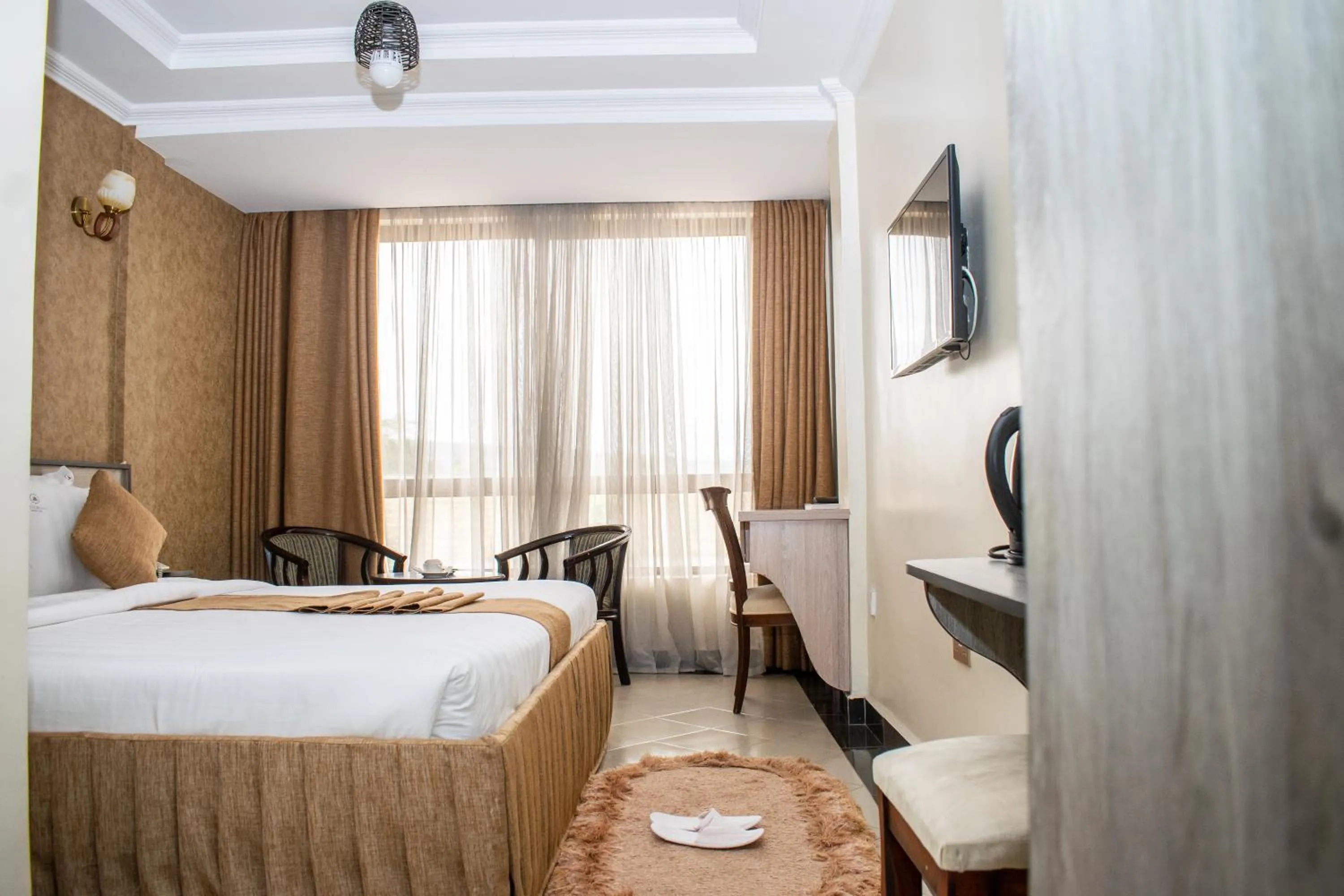 Bed in Astorian Grand Hotel Naivasha