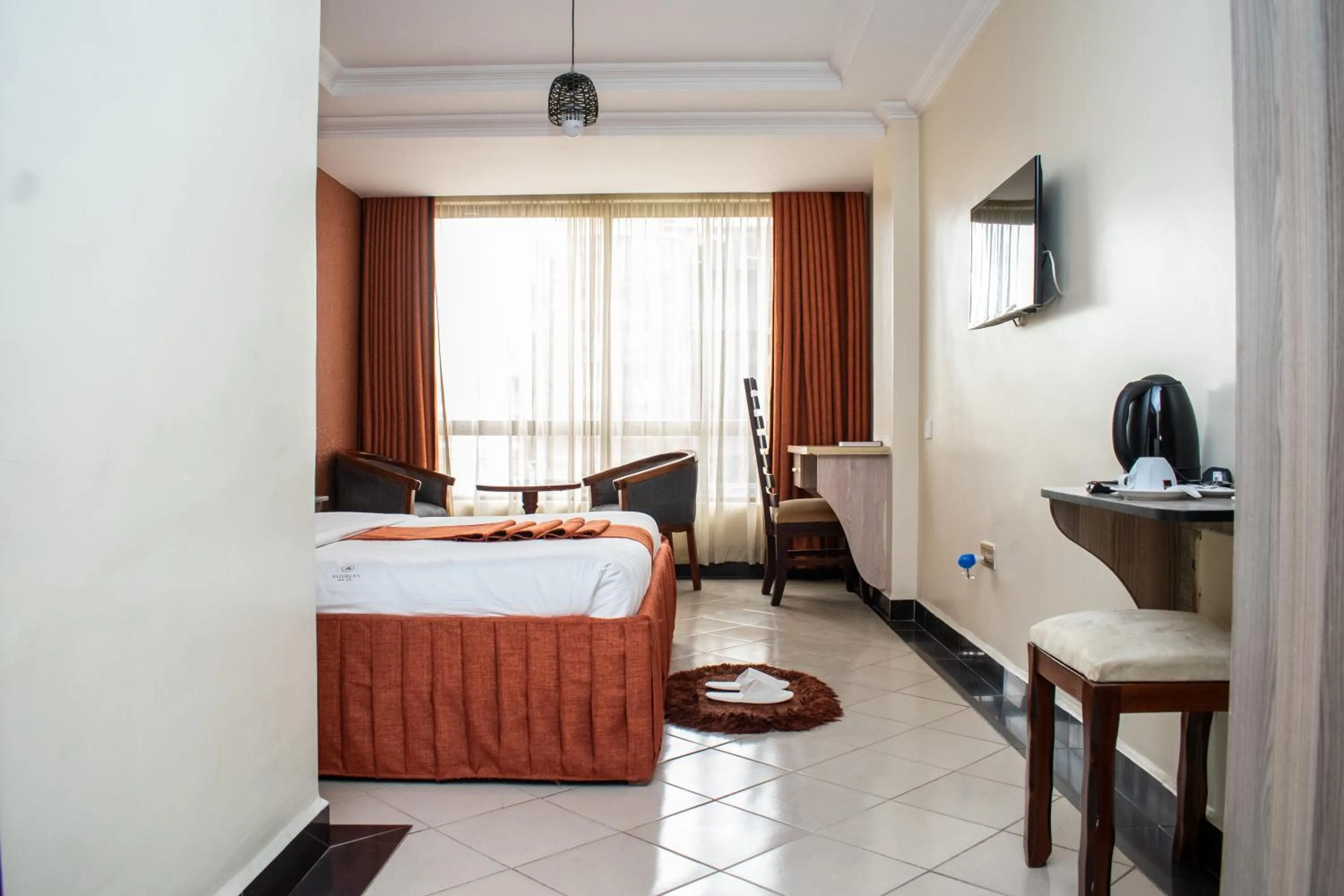 Bed in Astorian Grand Hotel Naivasha