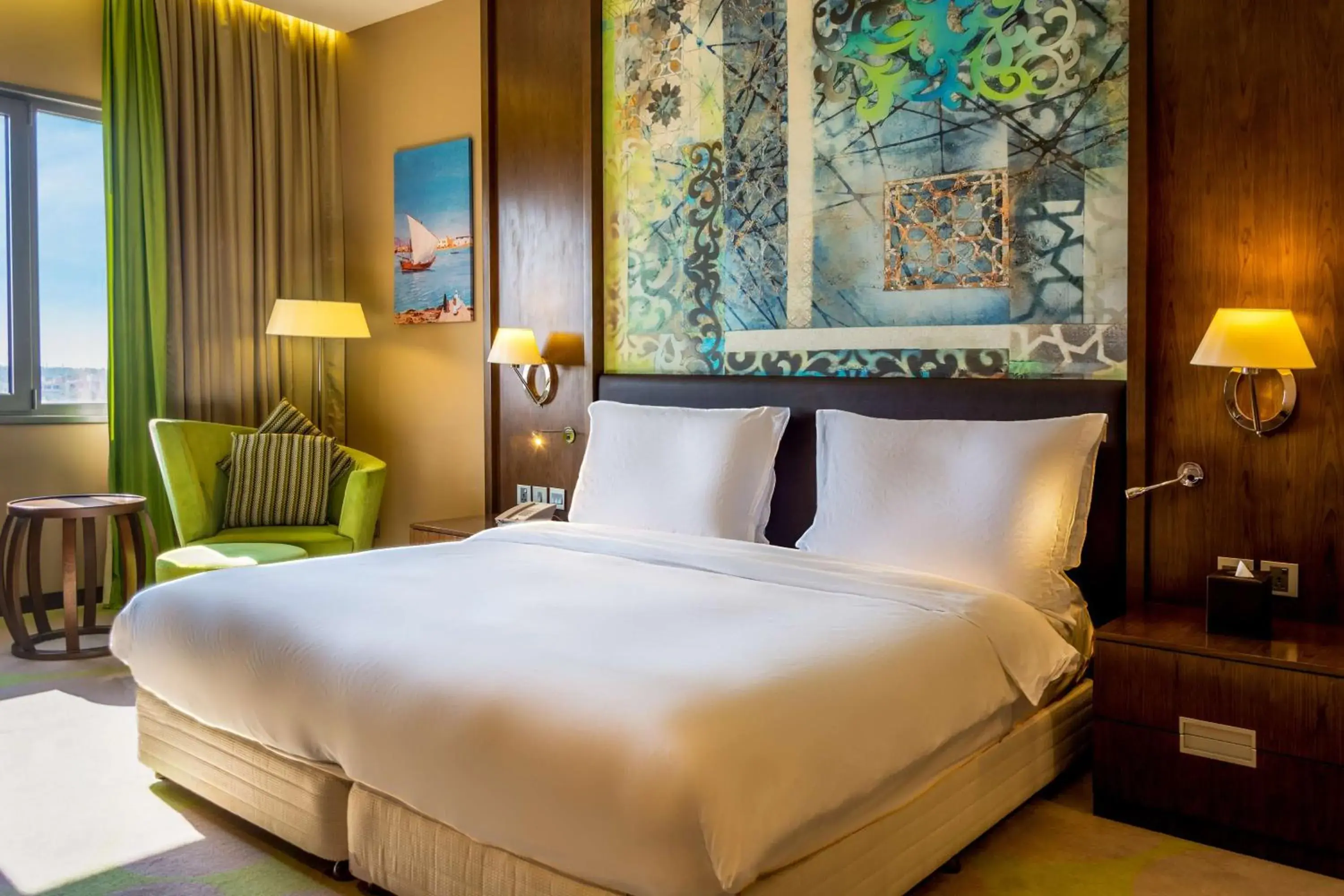 Photo of the whole room, Bed in Radisson Blu Hotel & Resort, Sohar Photo of the whole room, Bed in Radisson Blu Hotel & Resort, Sohar