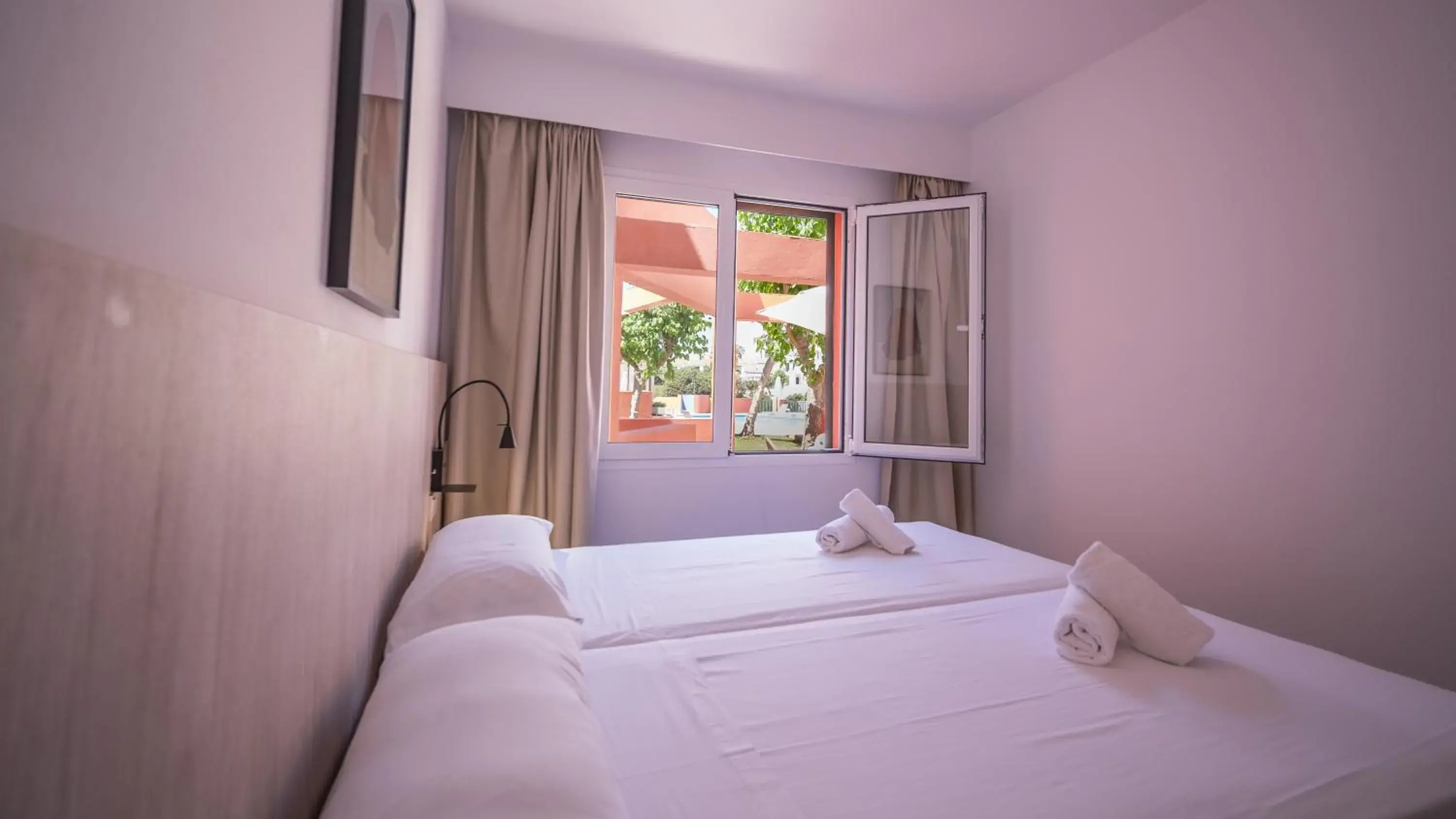Bedroom, Bed in Sant Joan Apartaments - Adults Only Bedroom, Bed in Sant Joan Apartaments - Adults Only
