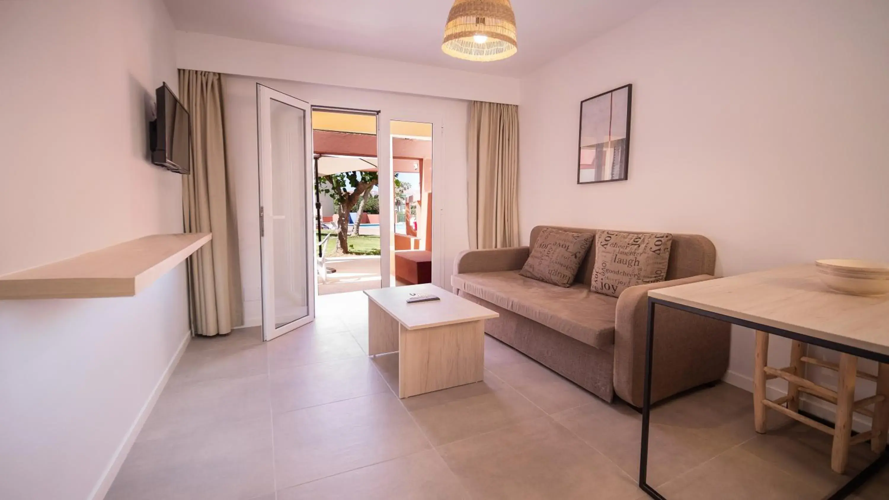Living room in Sant Joan Apartaments - Adults Only Living room in Sant Joan Apartaments - Adults Only
