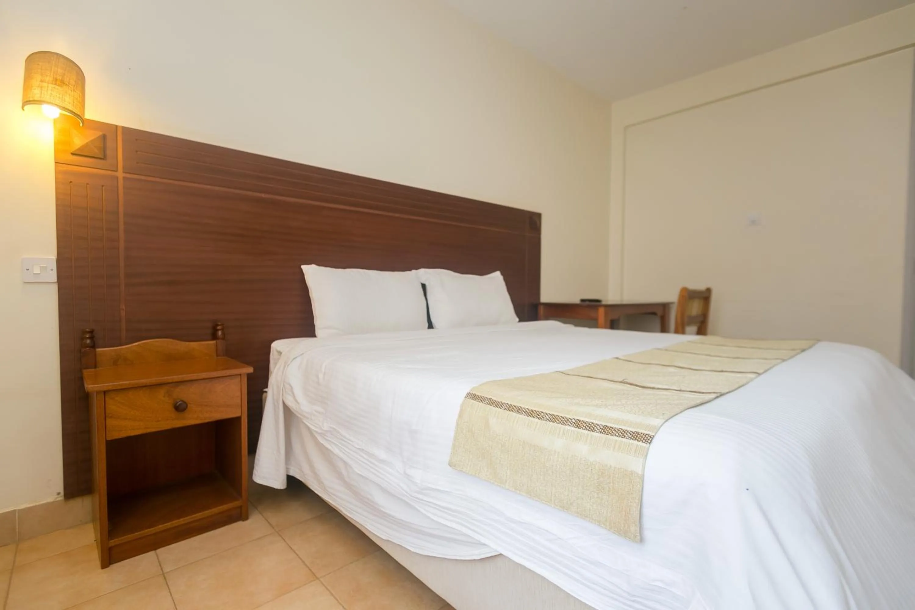 Bed in Corat Africa Hotel