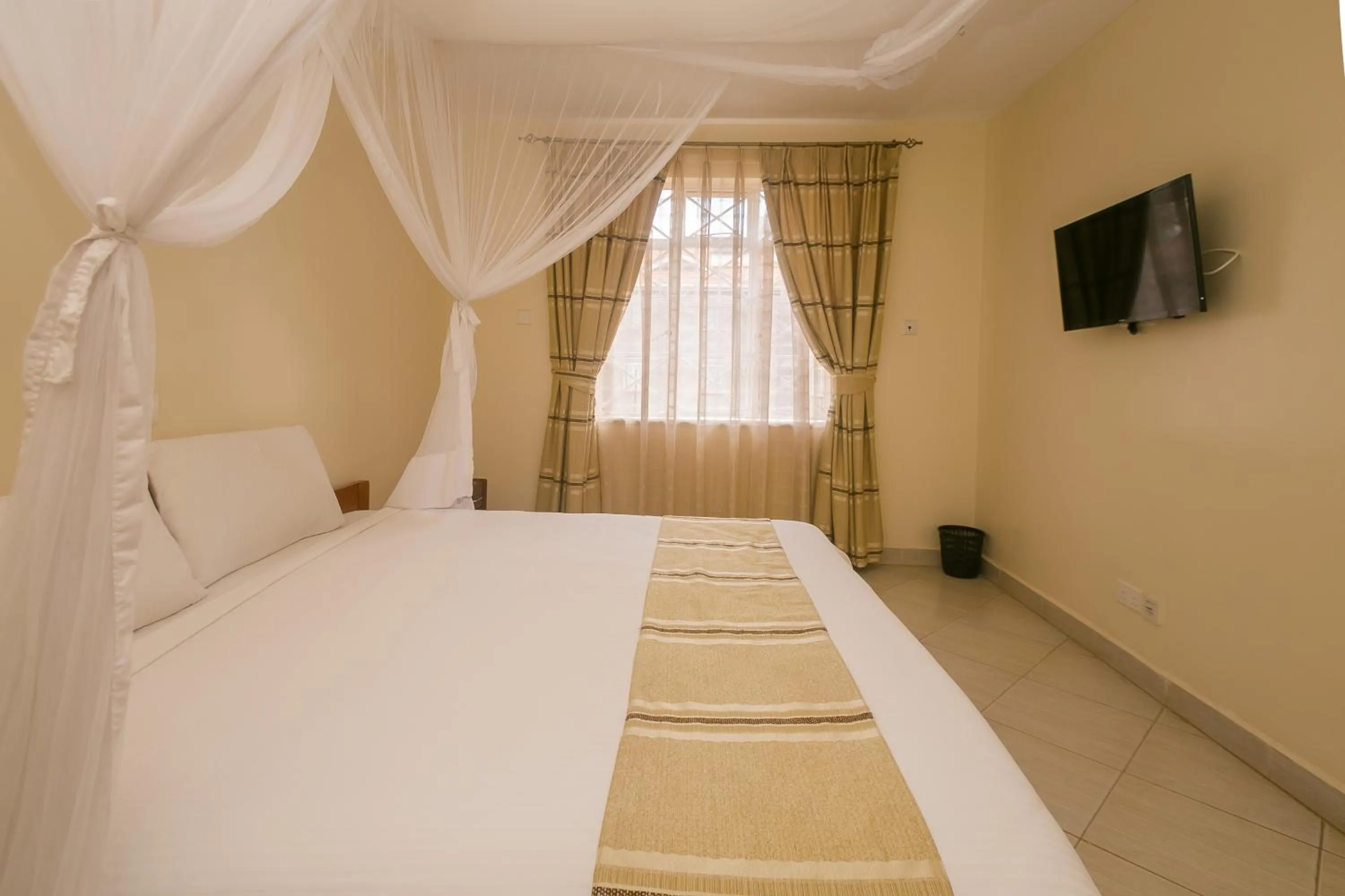 Bed in Corat Africa Hotel
