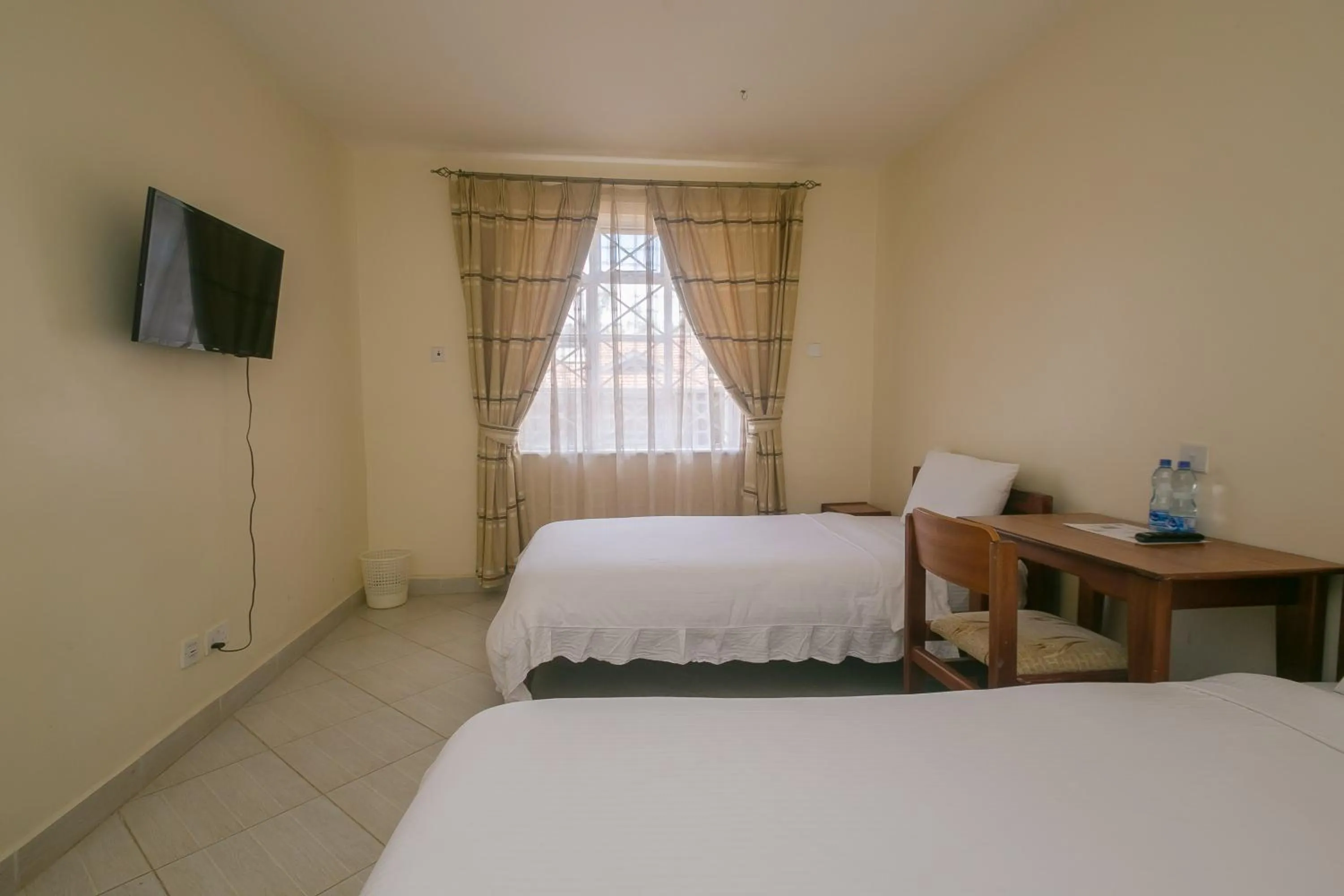 Bed in Corat Africa Hotel