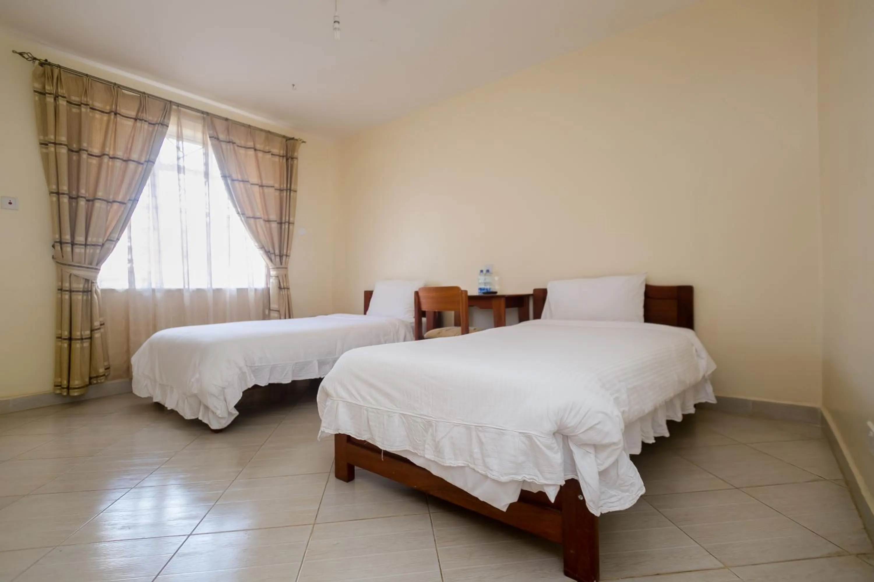 Bed in Corat Africa Hotel