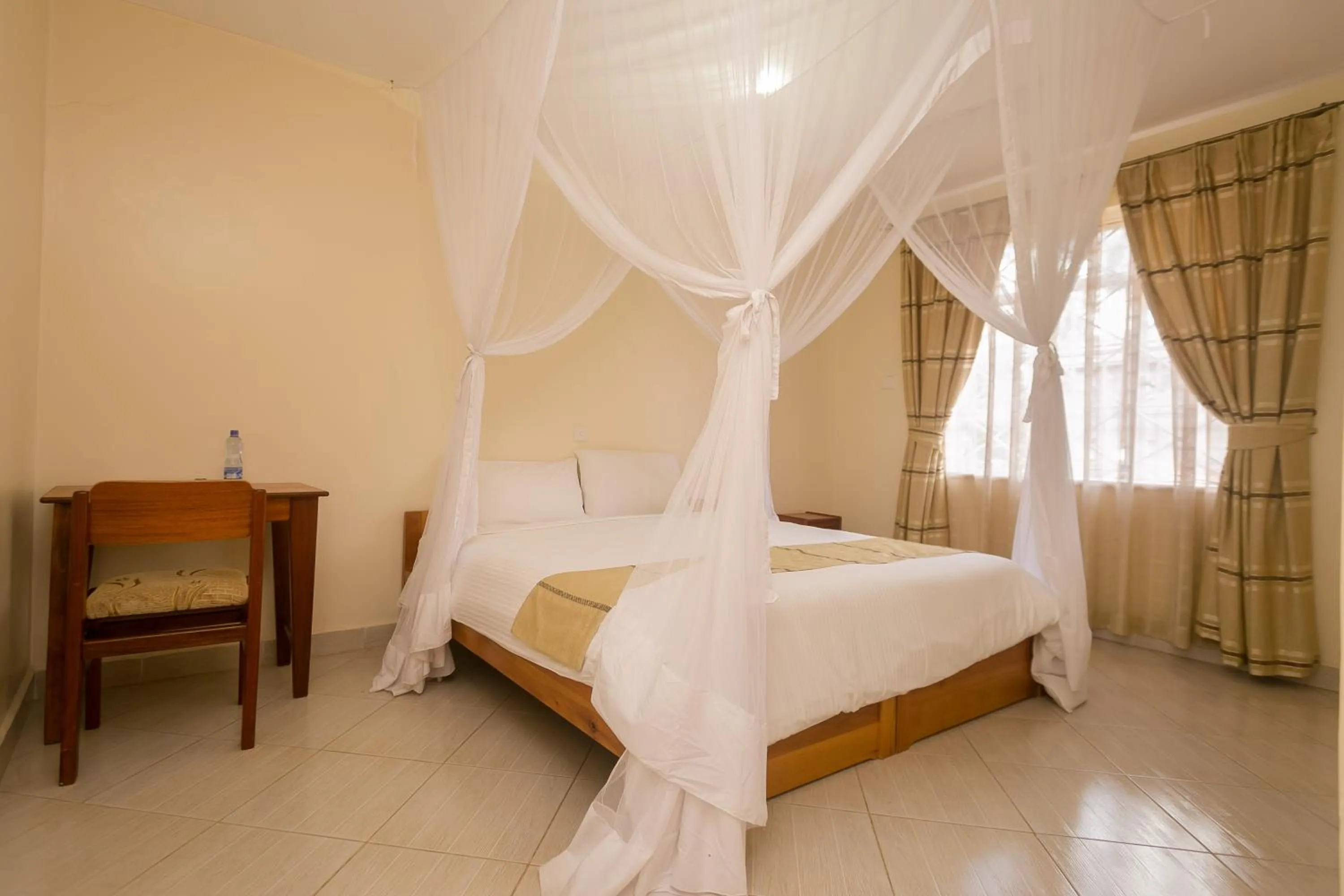 Bed in Corat Africa Hotel