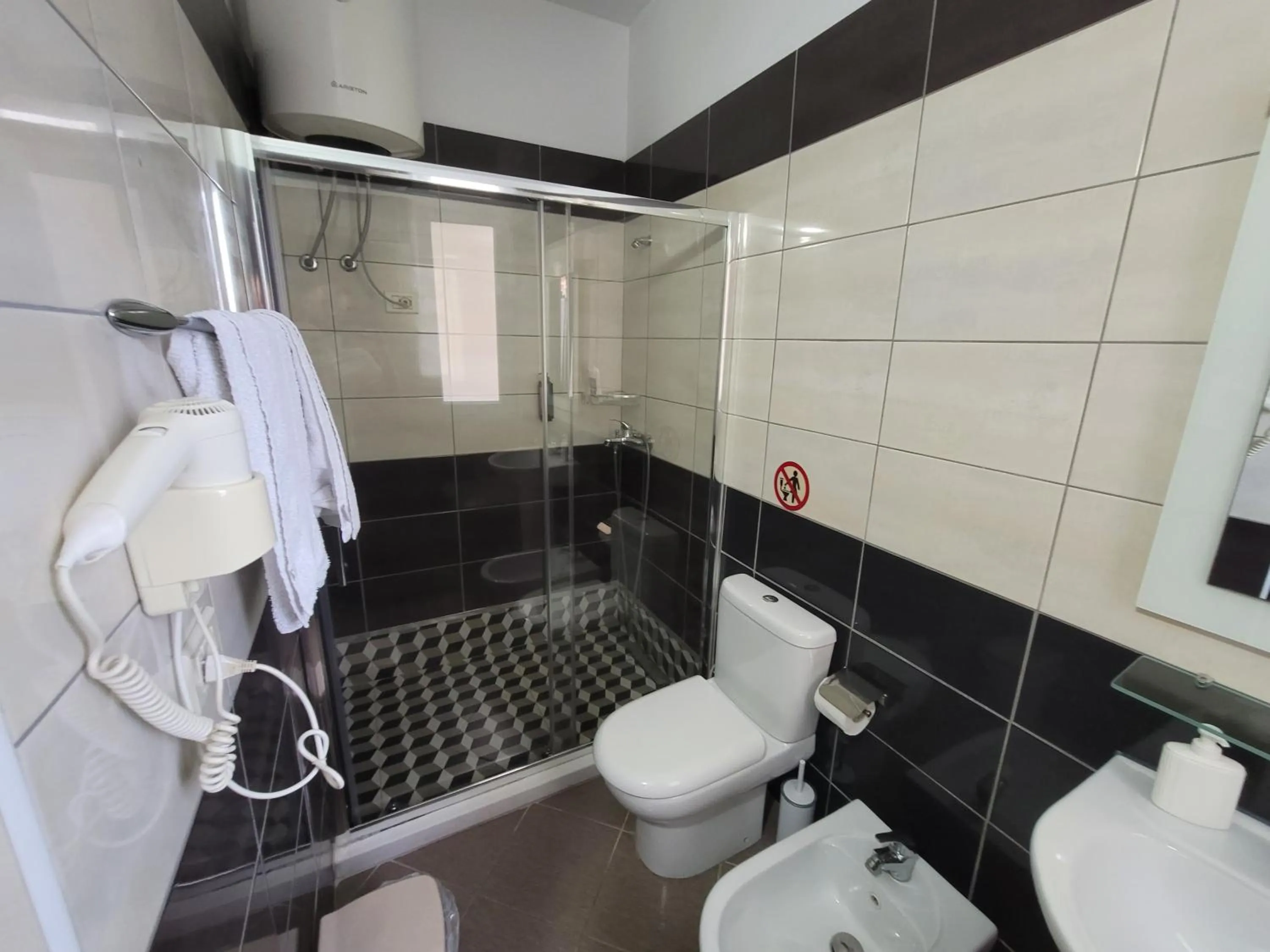 Shower in Haris Hotel