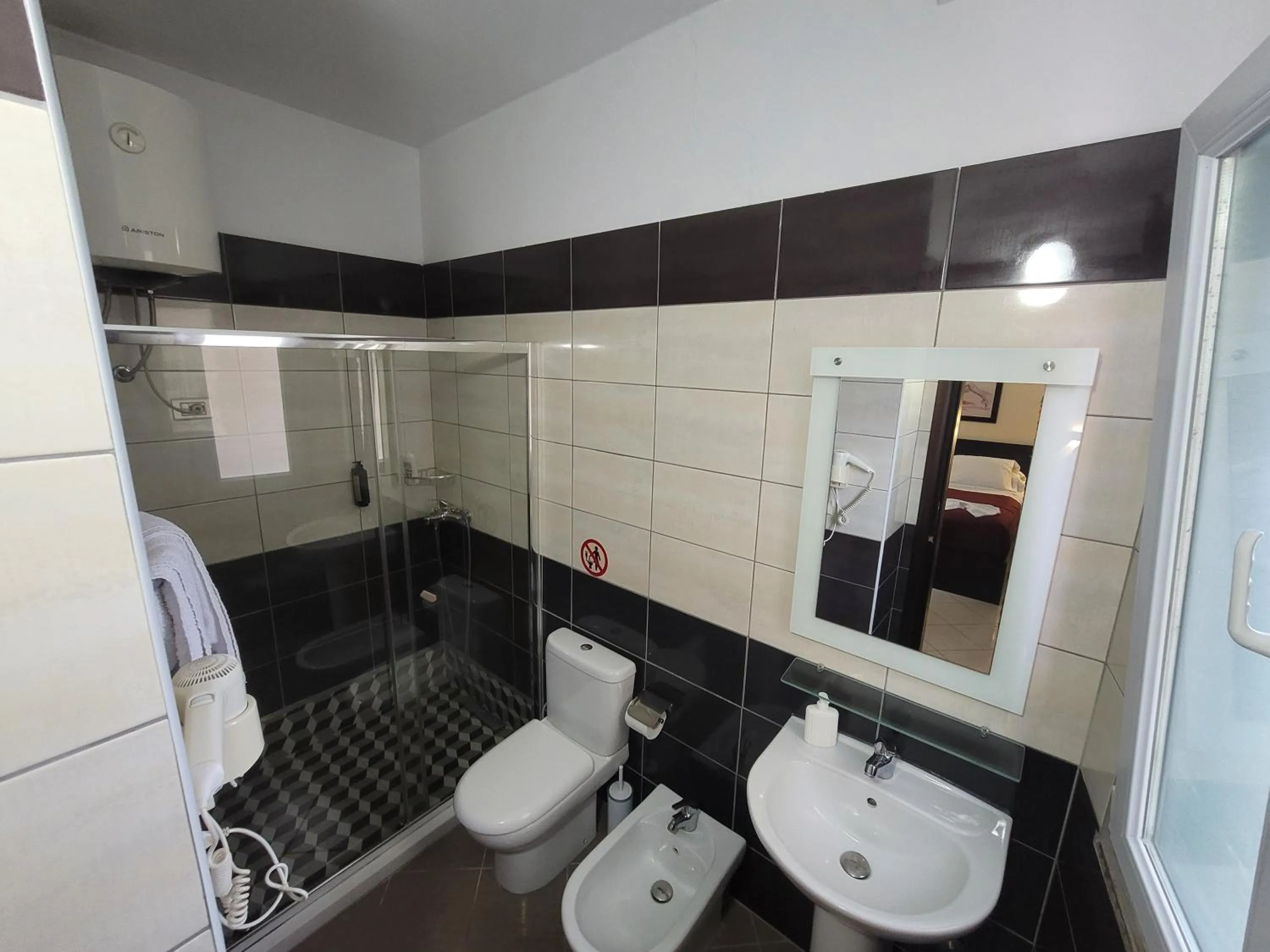 Shower in Haris Hotel