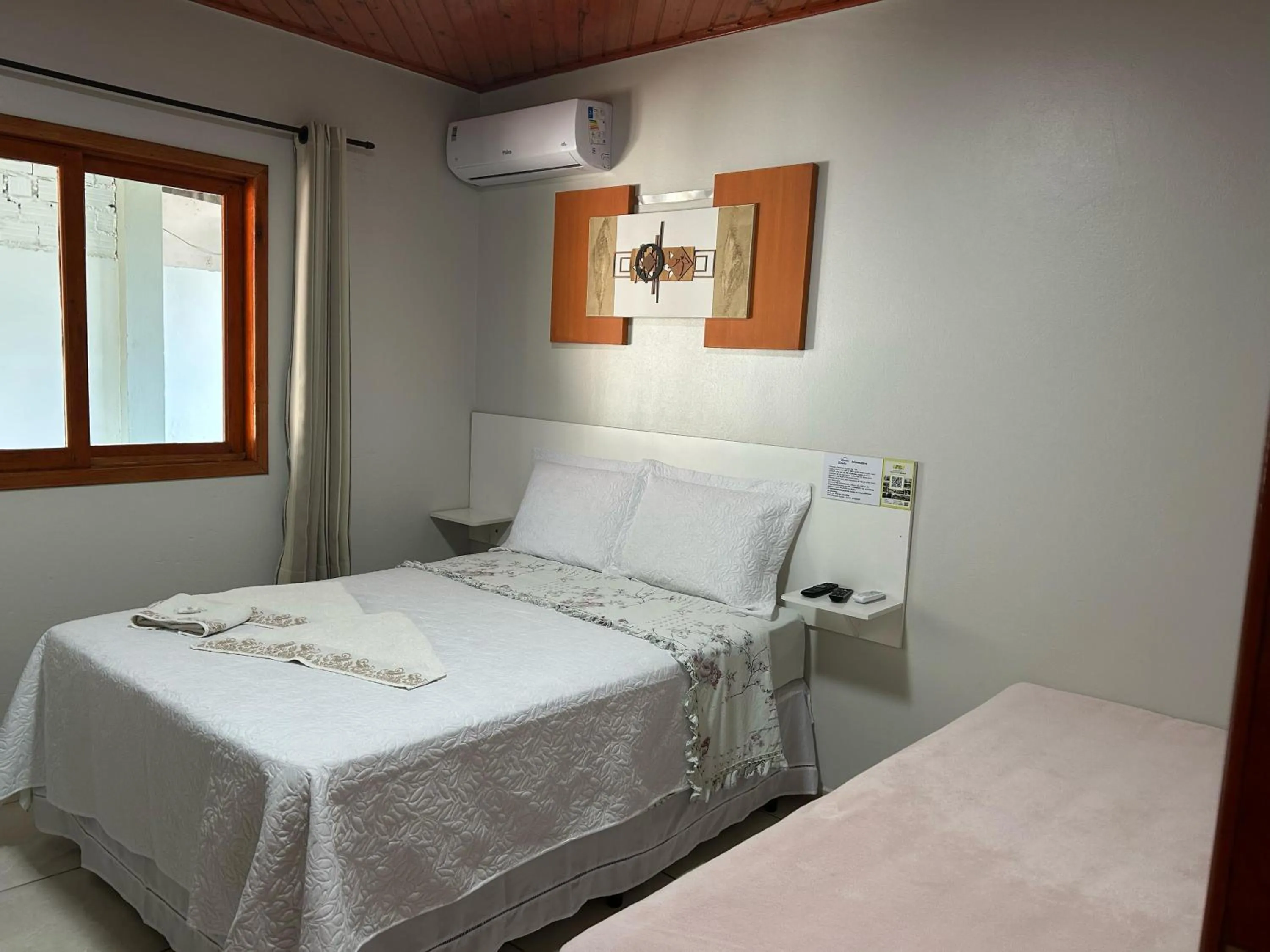 Bed in Pousada Angela