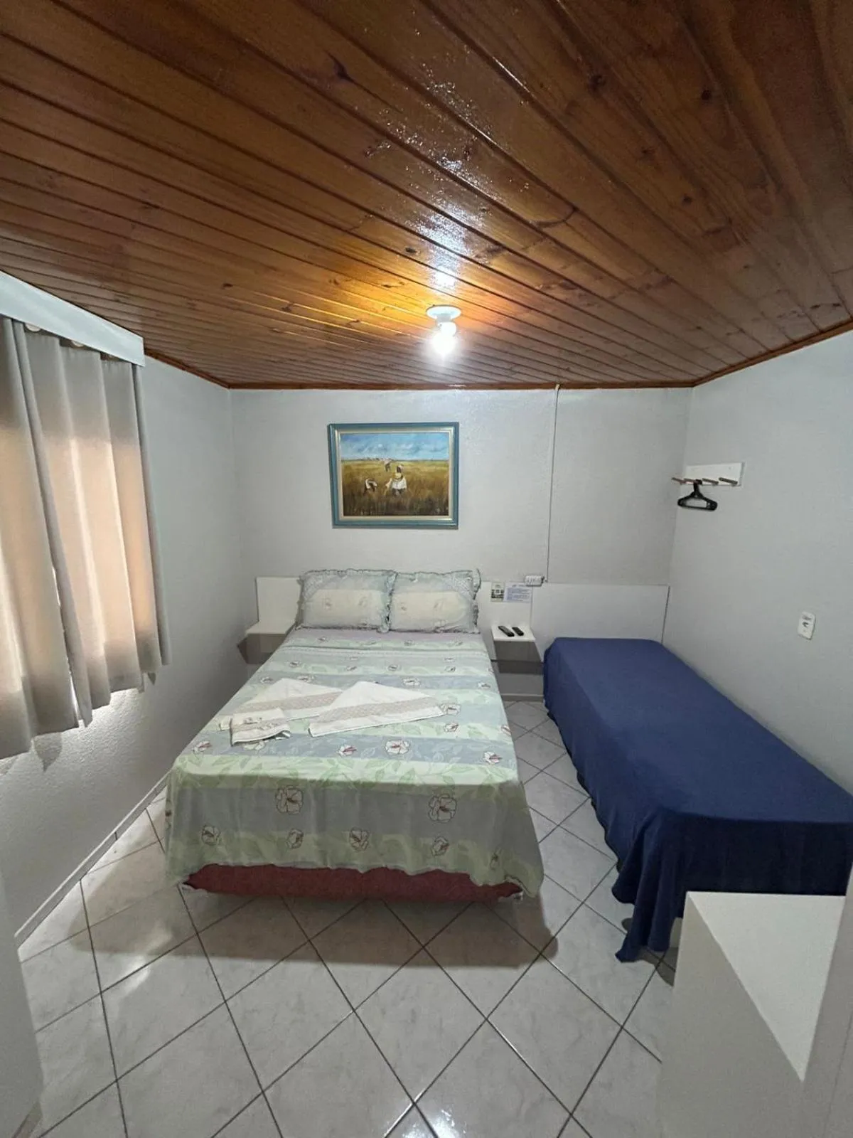 Bed in Pousada Angela