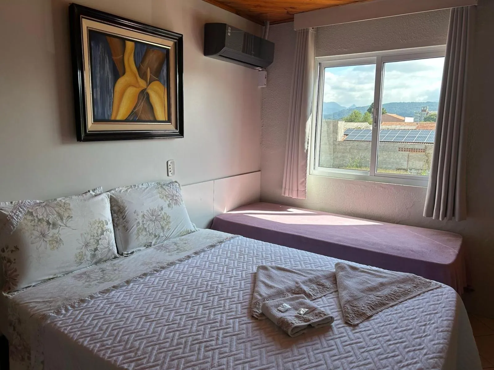 Bed in Pousada Angela