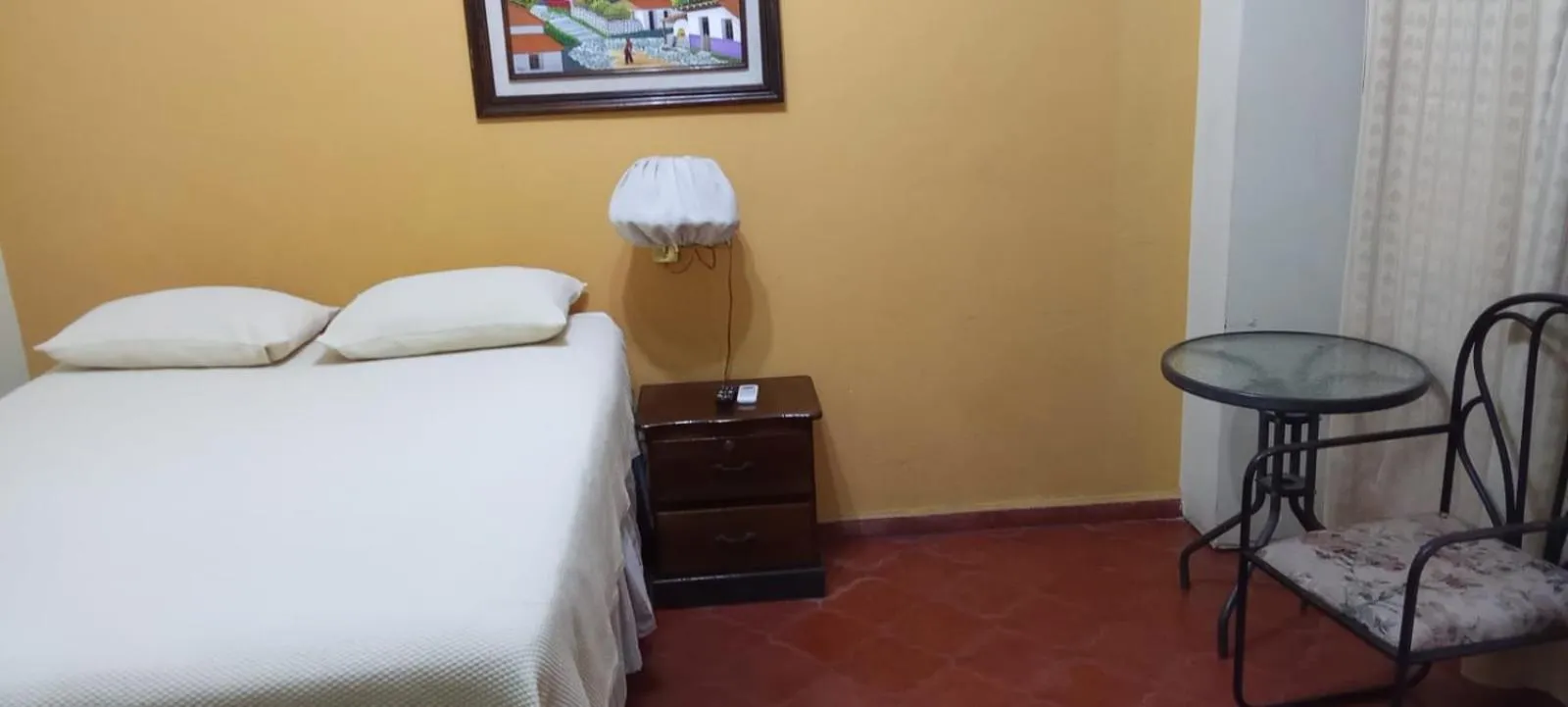 Bed in Hotel Acropolis Maya