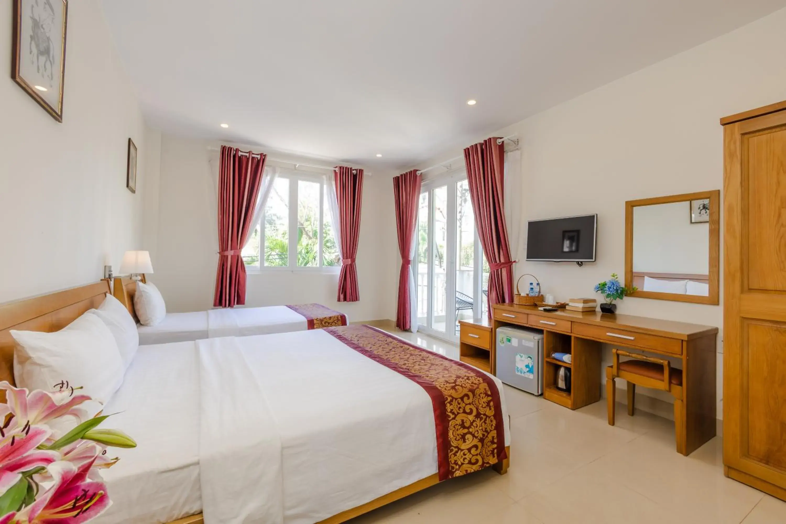 Deluxe Triple Room in T&T Resort and Spa Phu Quoc Deluxe Triple Room in T&T Resort and Spa Phu Quoc