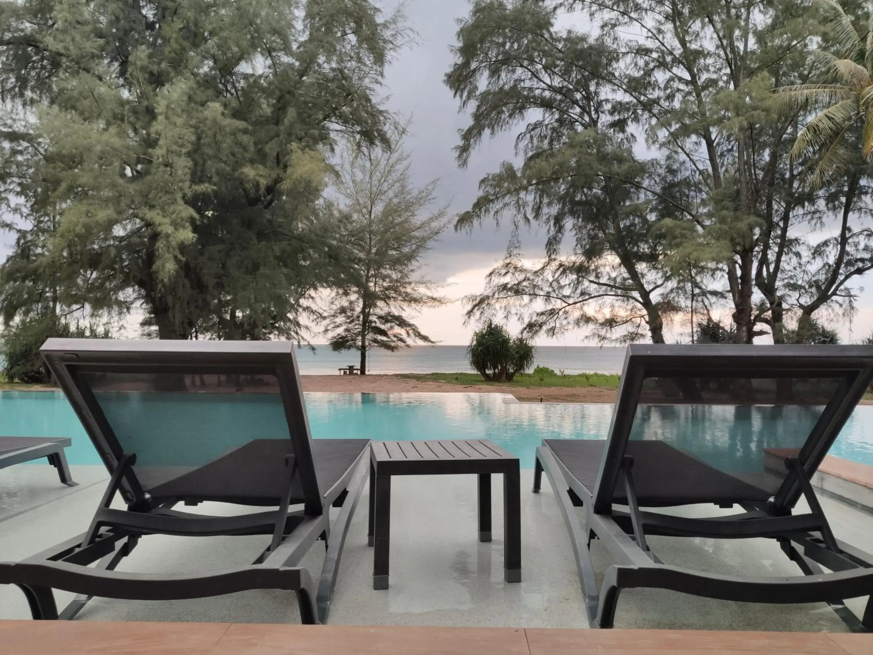 Pool view in Coriacea Beachfront Boutique Phuket Resort Pool view in Coriacea Beachfront Boutique Phuket Resort