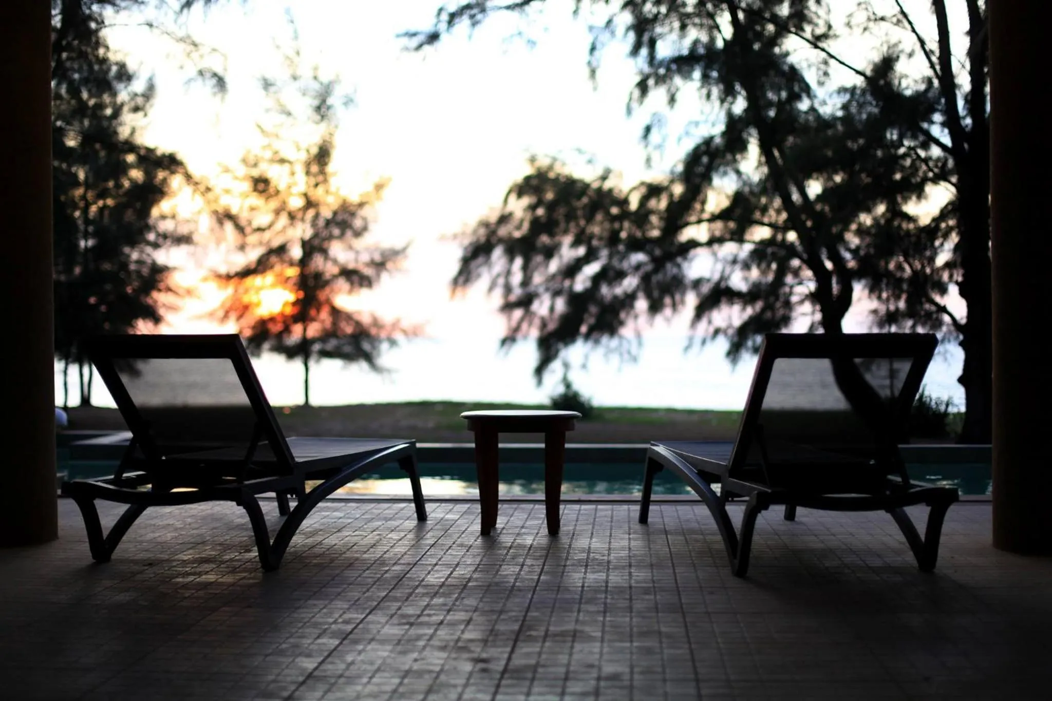 Swimming pool in Coriacea Beachfront Boutique Phuket Resort