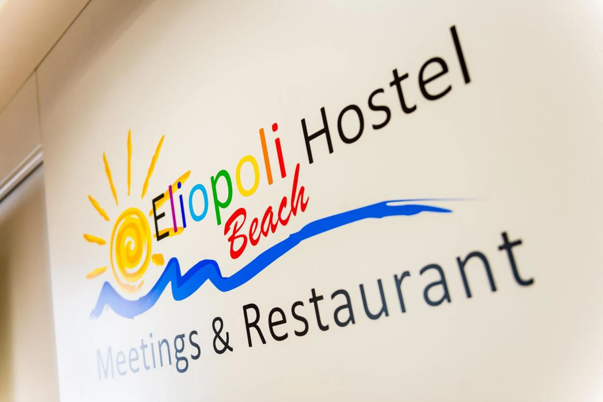 Property logo or sign in Eliopoli Beach Hostel & Restaurant