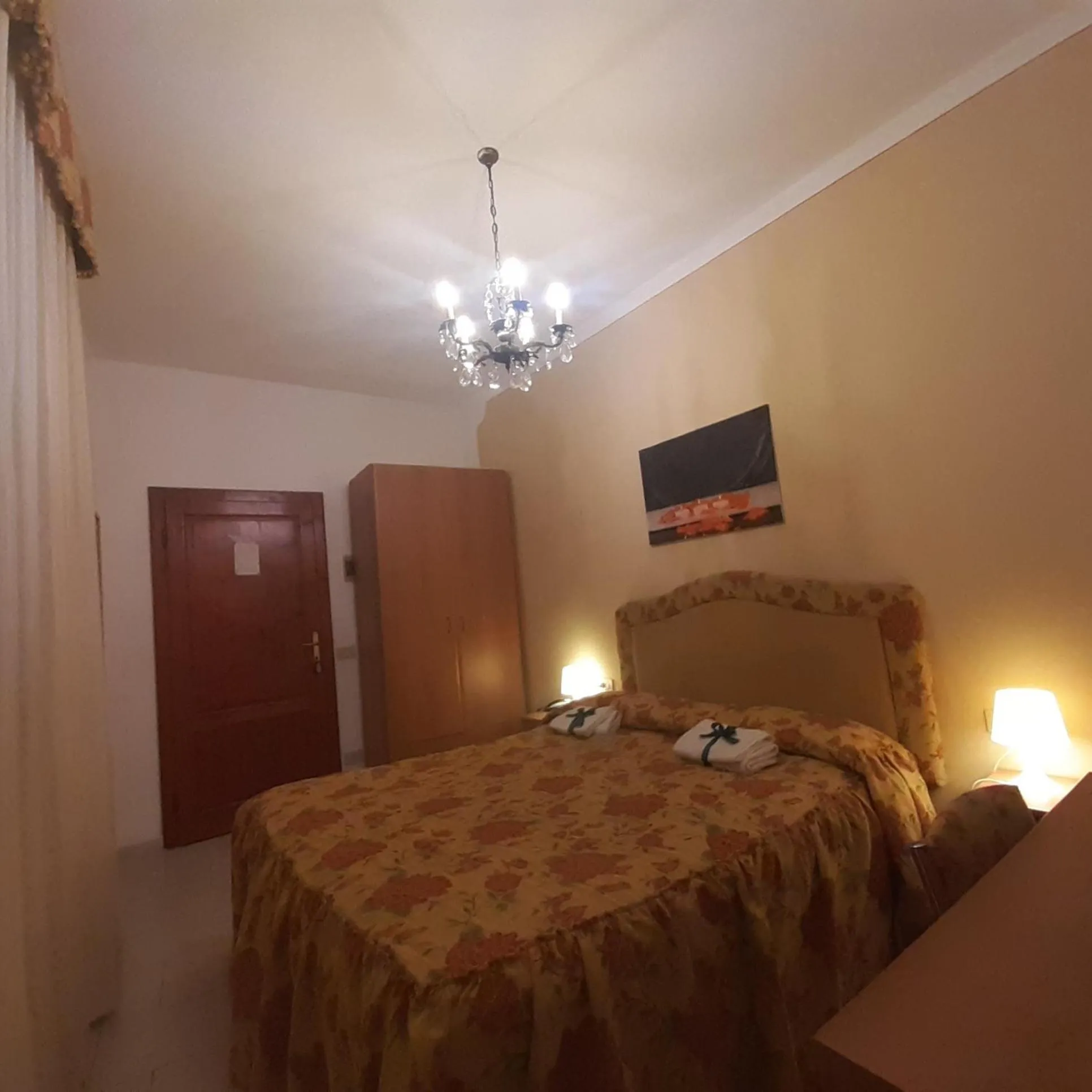 Bed in Hotel Ambrogini