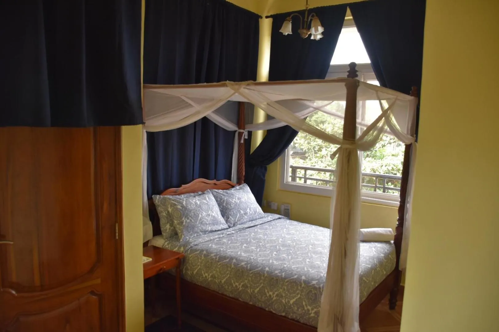 Bed in East Point Hotel Moshi