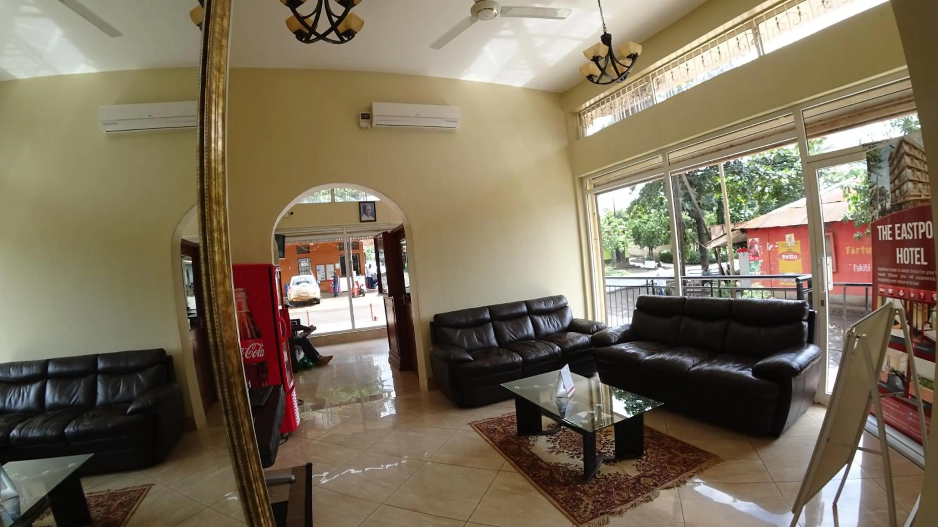 Communal lounge/ TV room in East Point Hotel Moshi