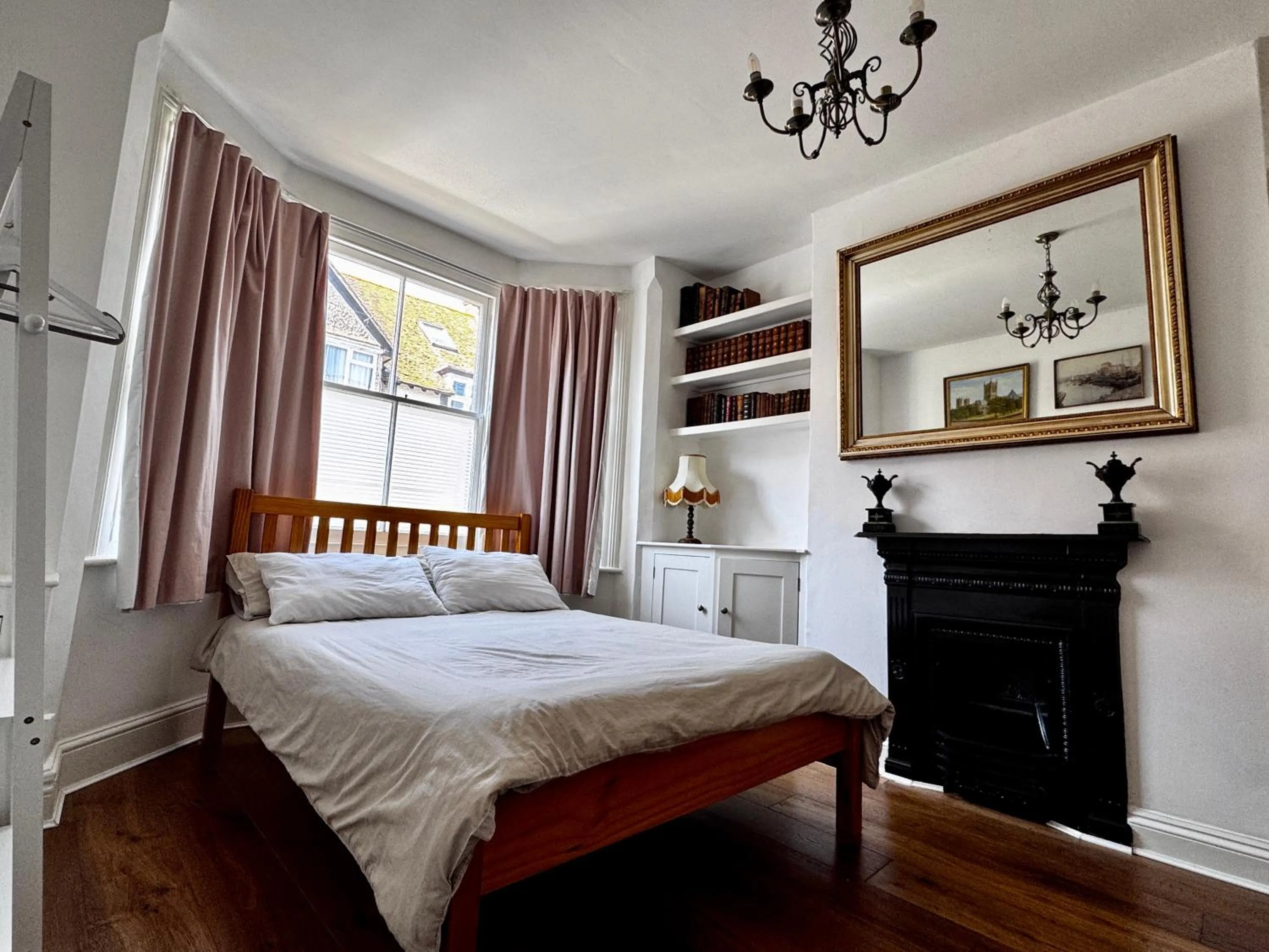 Photo of the whole room, Bed in Cozy Place