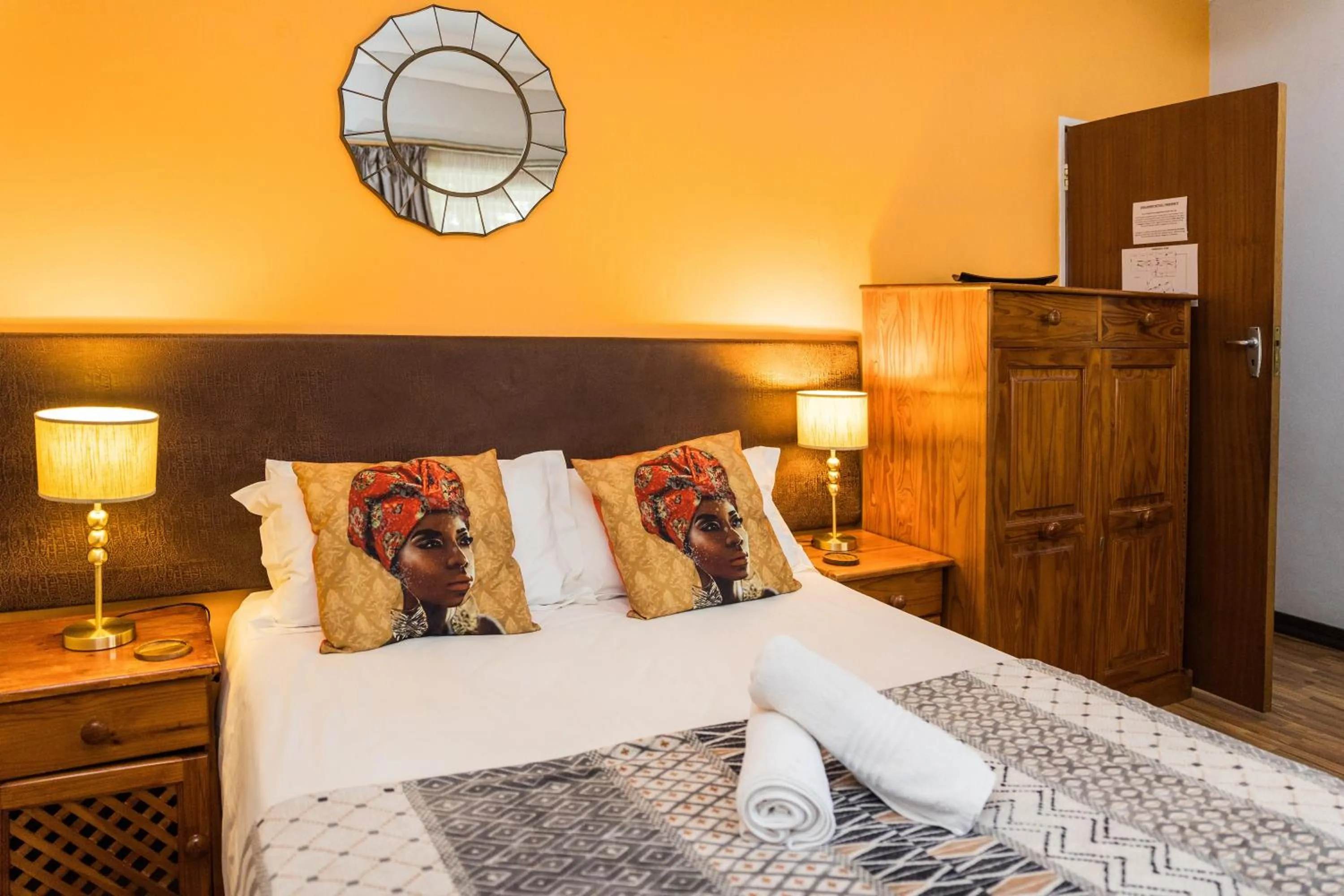 Bed in Rozendal Guest House