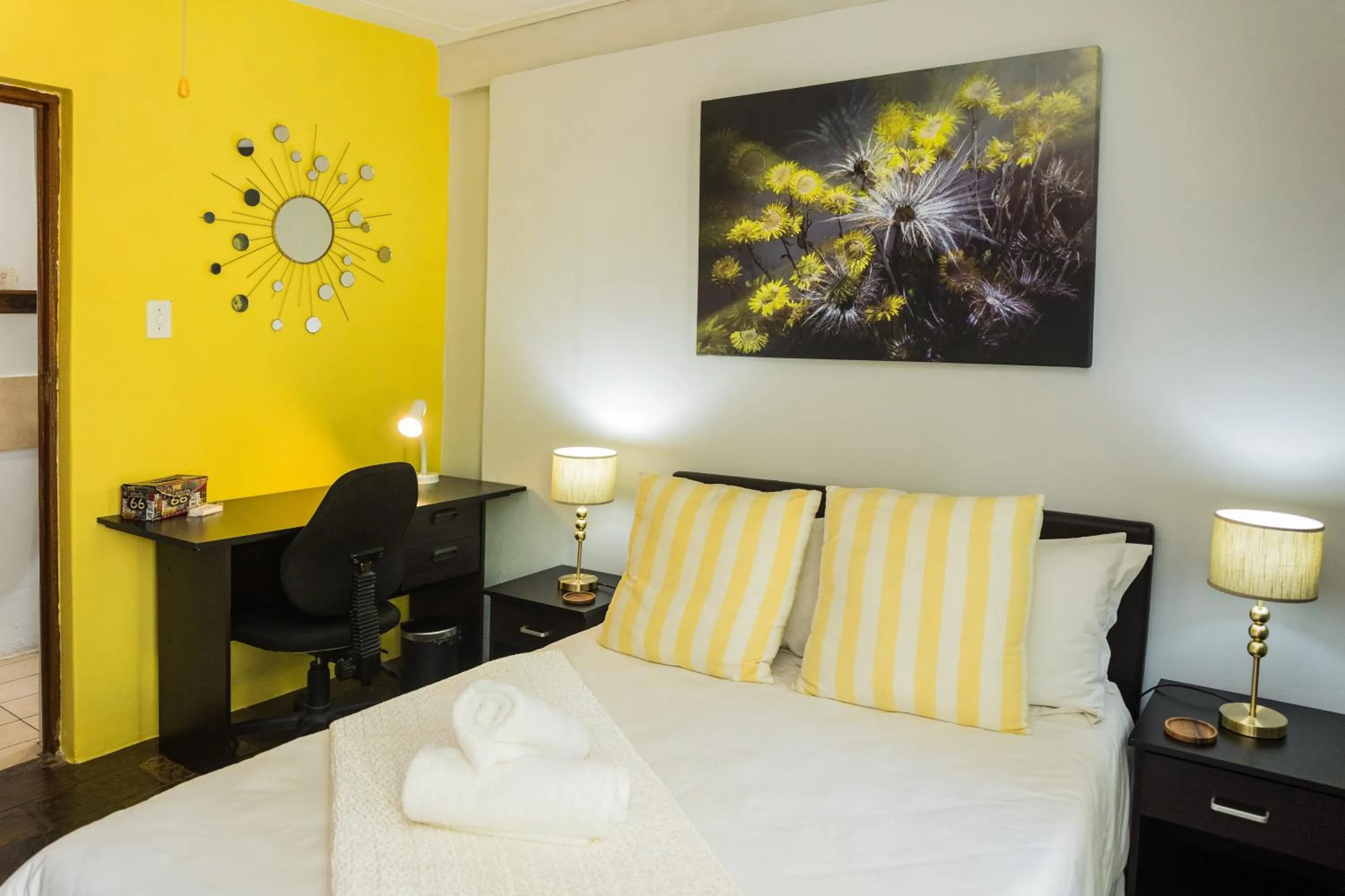 Bed in Rozendal Guest House