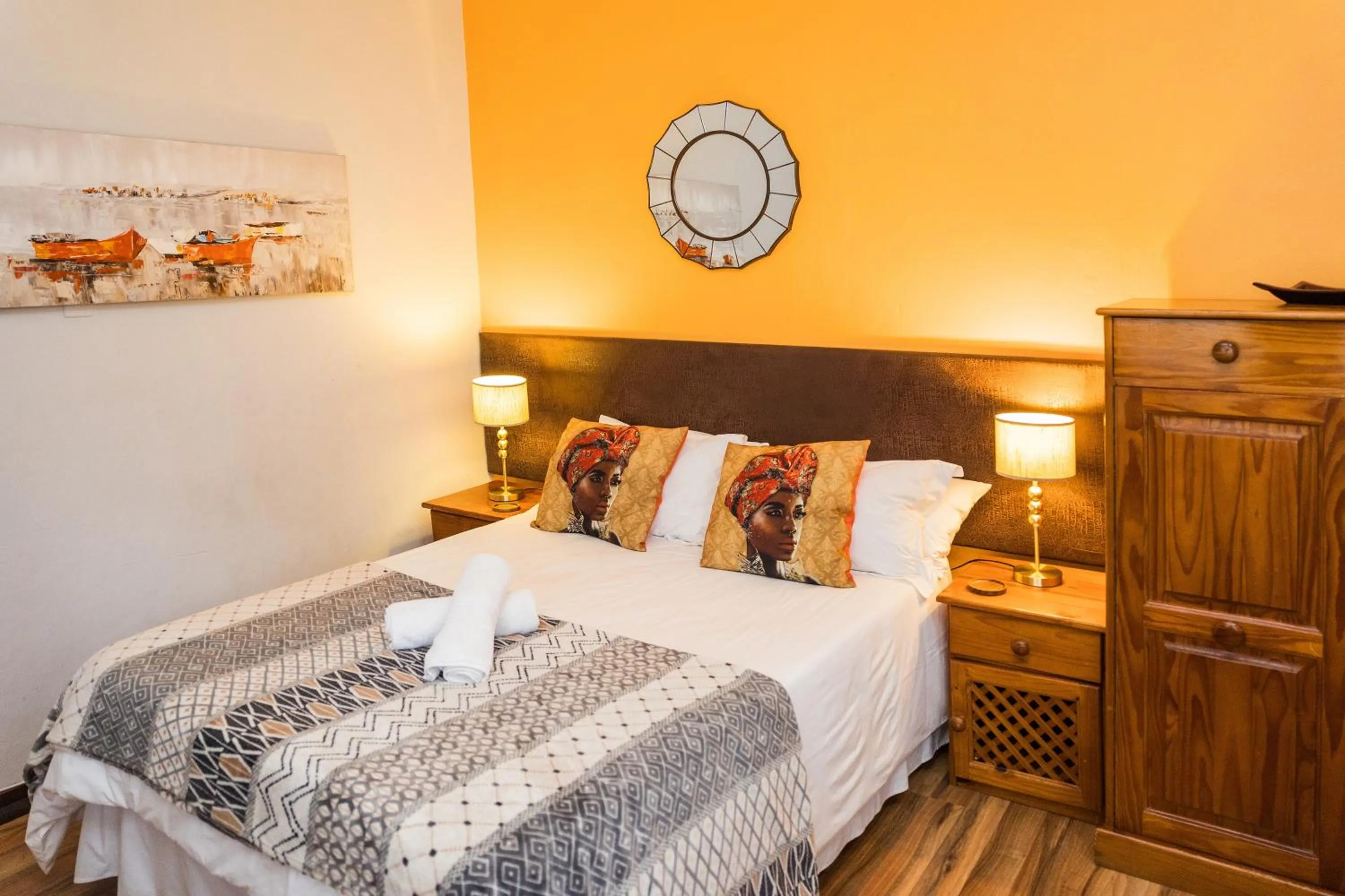 Bed in Rozendal Guest House