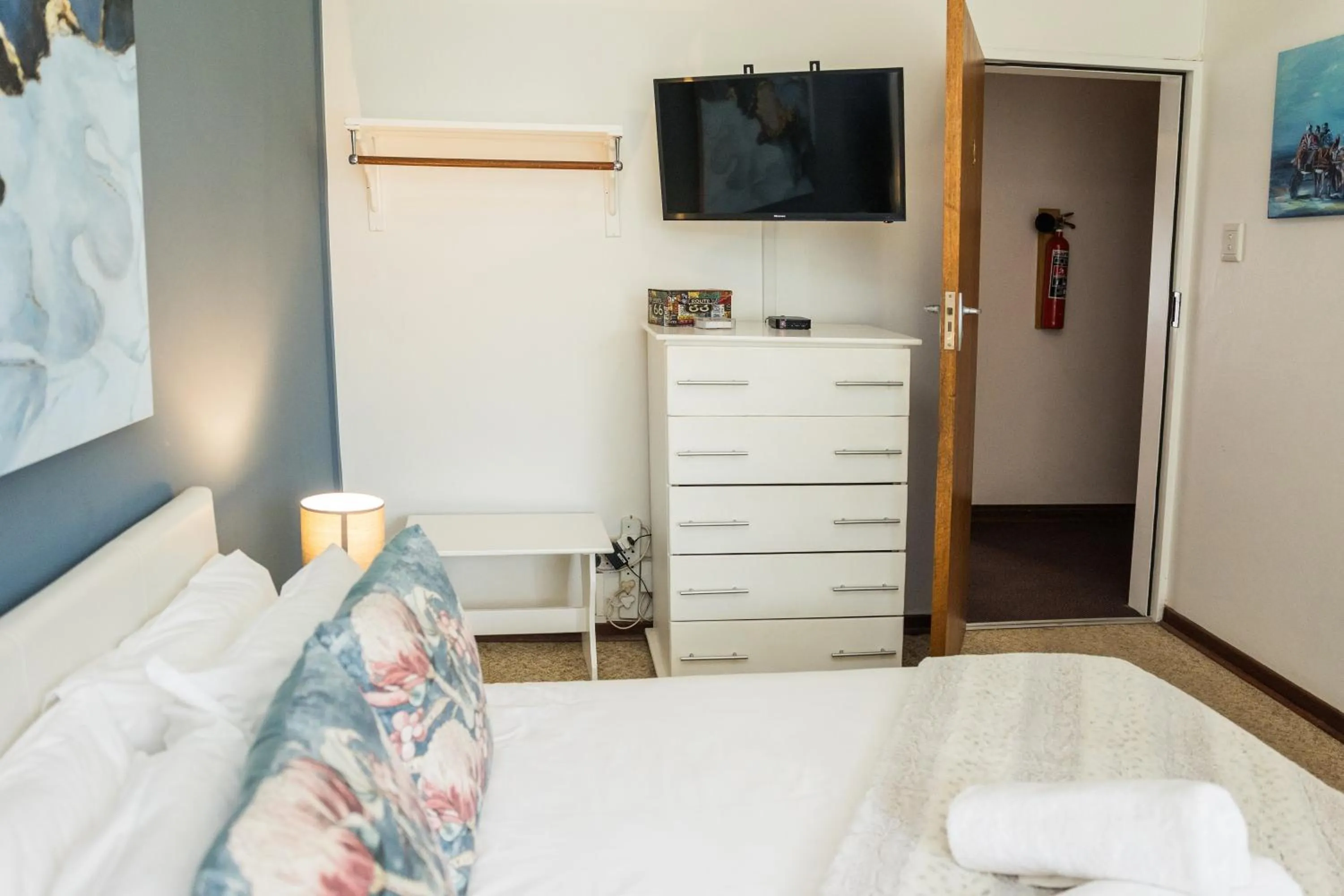 Bed in Rozendal Guest House