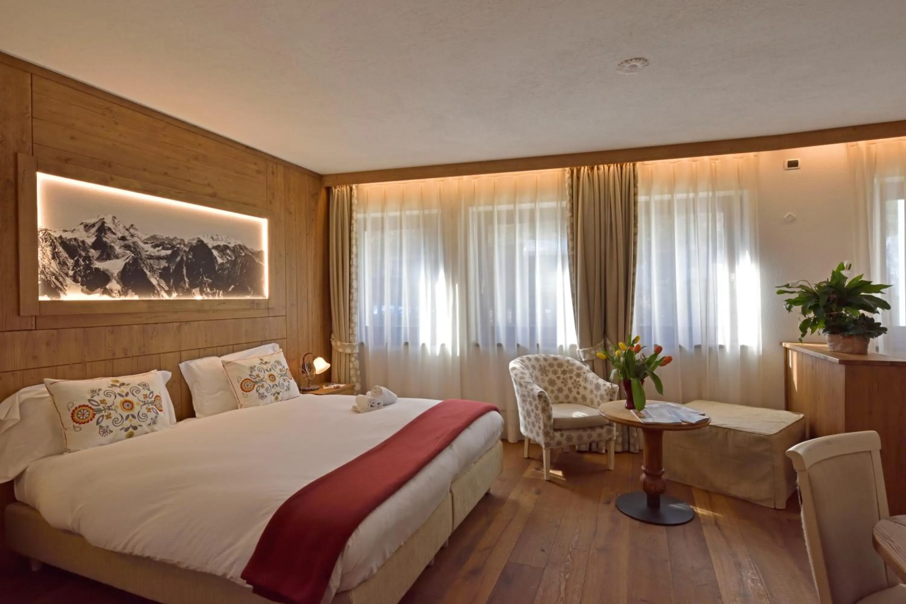 Bed in Hotel Beau Sejour