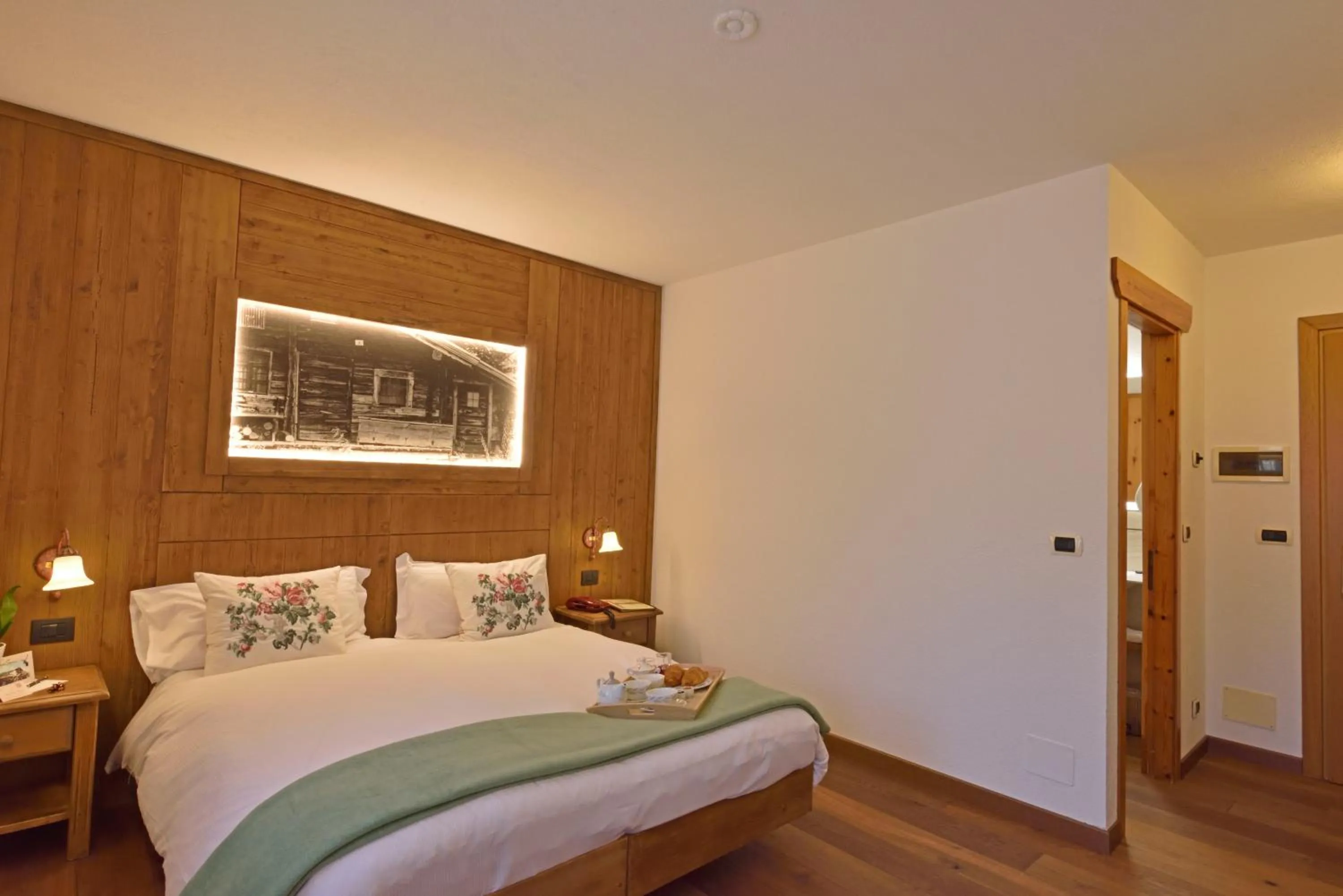 Bed in Hotel Beau Sejour