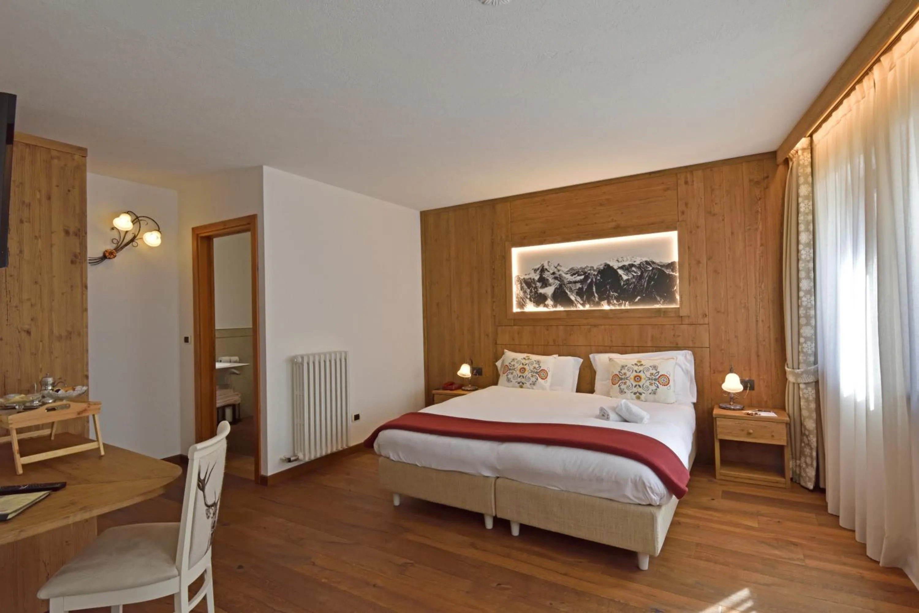 Bed in Hotel Beau Sejour