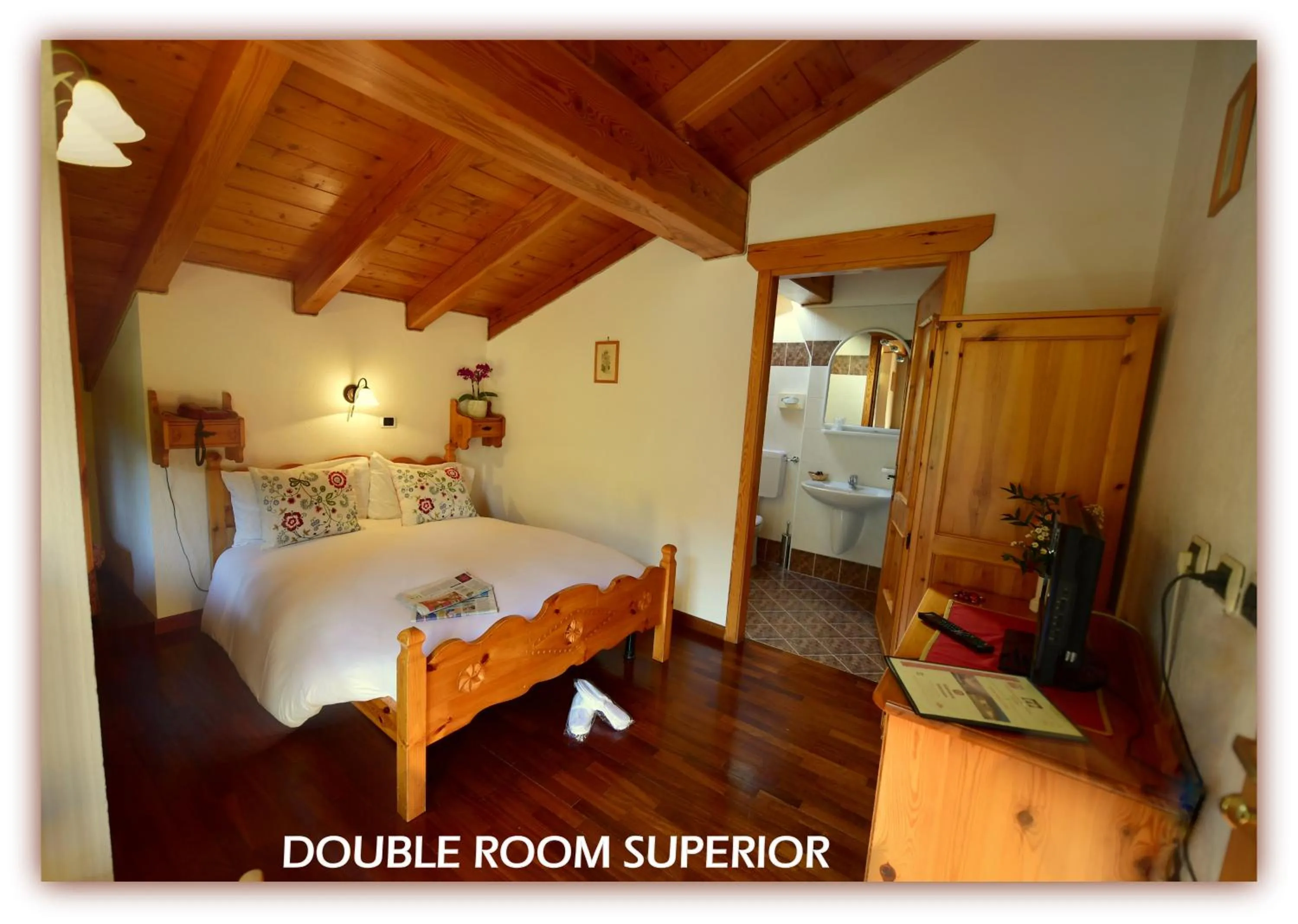 Bed in Hotel Beau Sejour