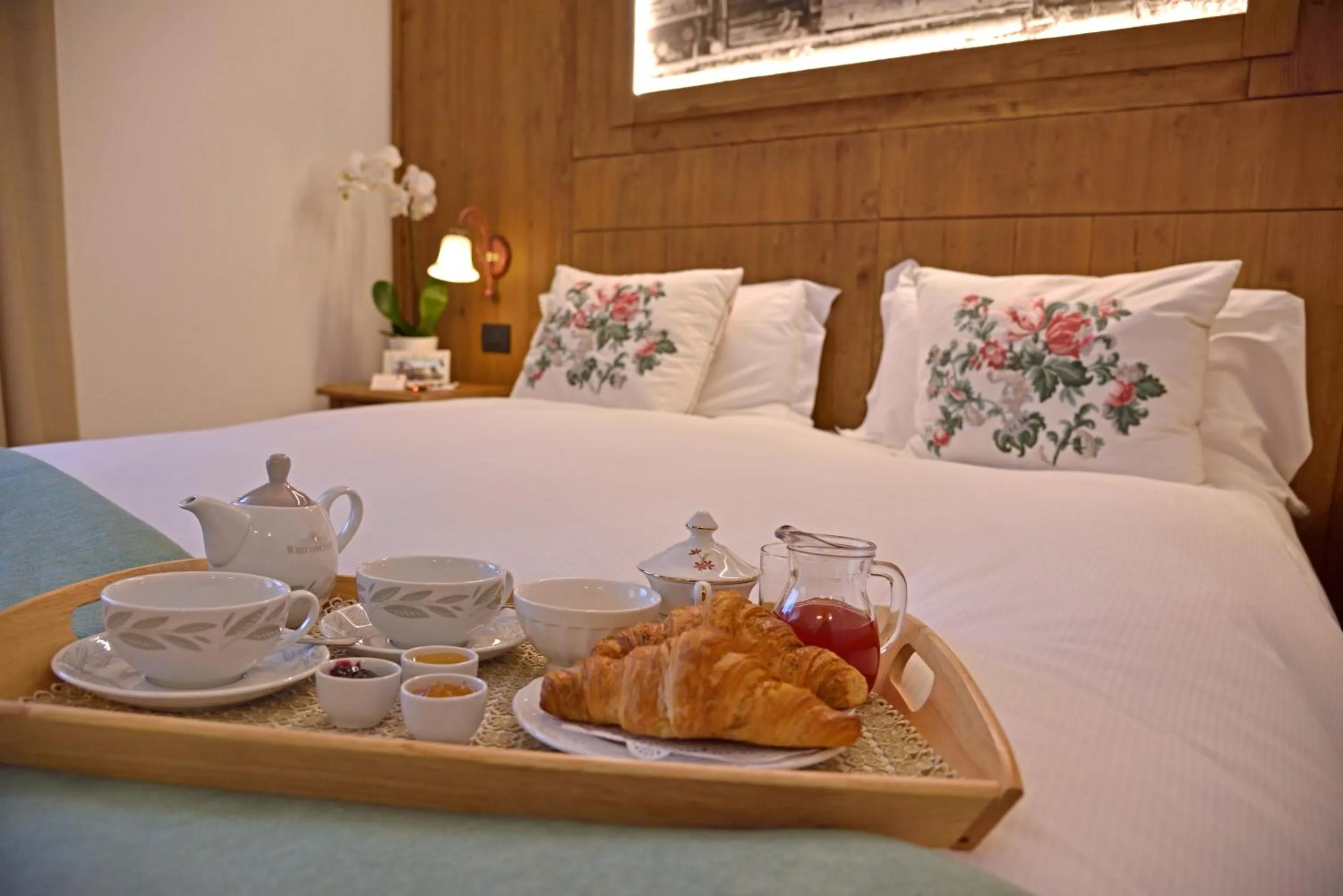 Bed in Hotel Beau Sejour