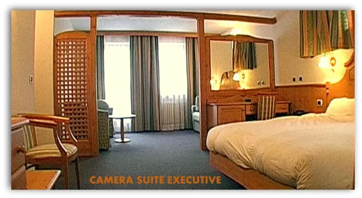 Seating area, Bed in Hotel Beau Sejour