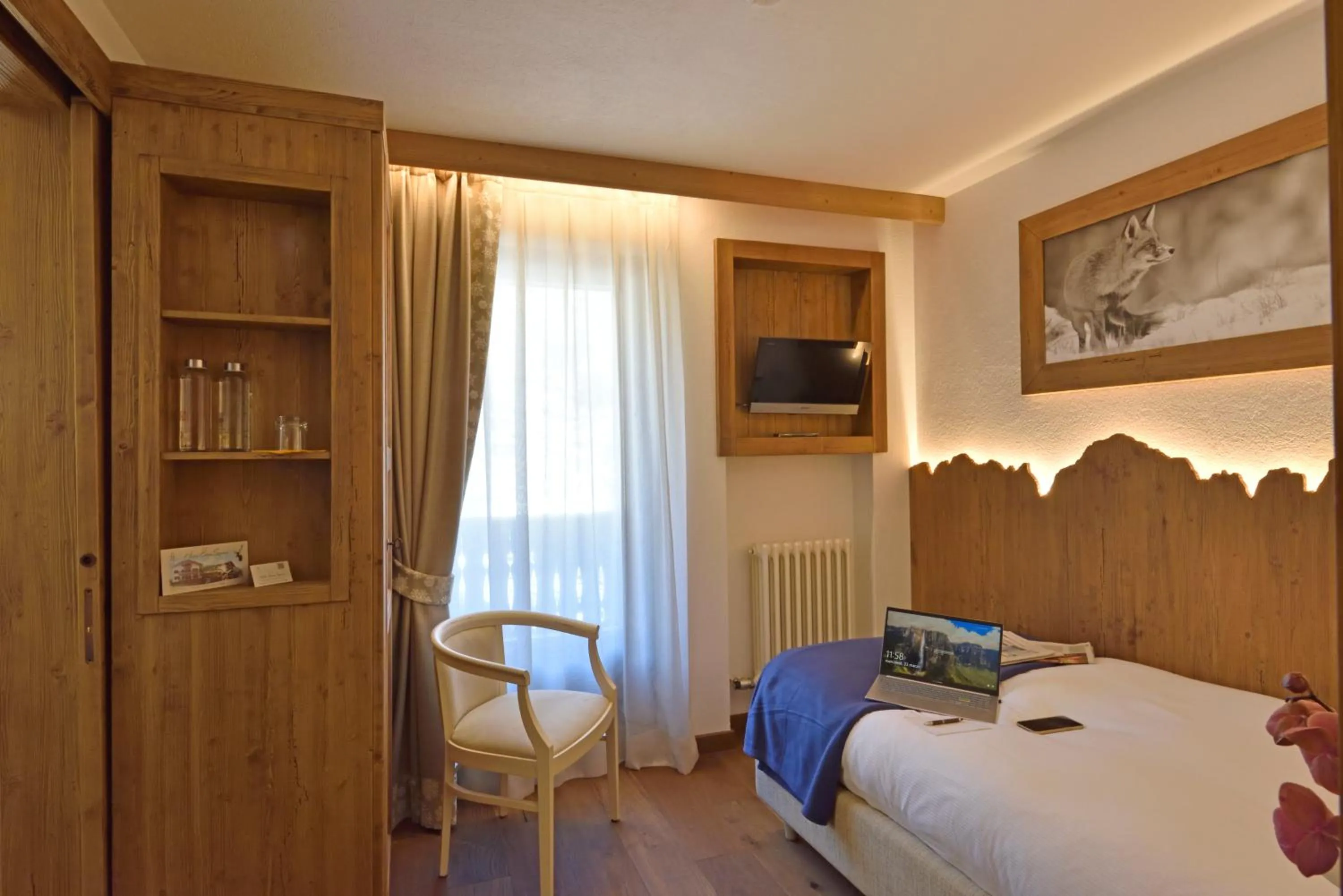 Bed in Hotel Beau Sejour