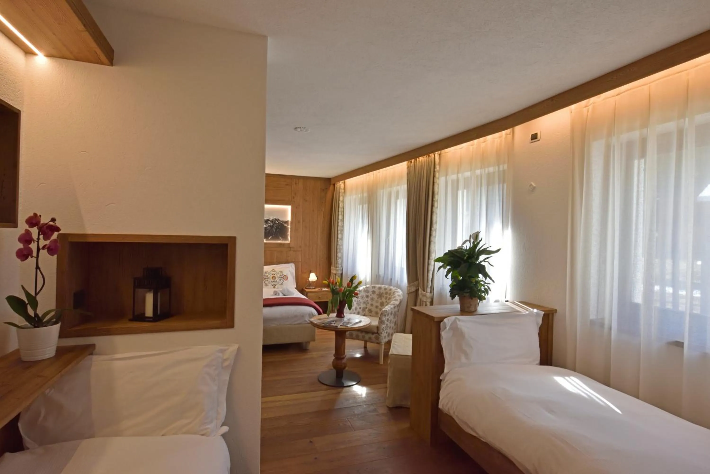 Bed in Hotel Beau Sejour