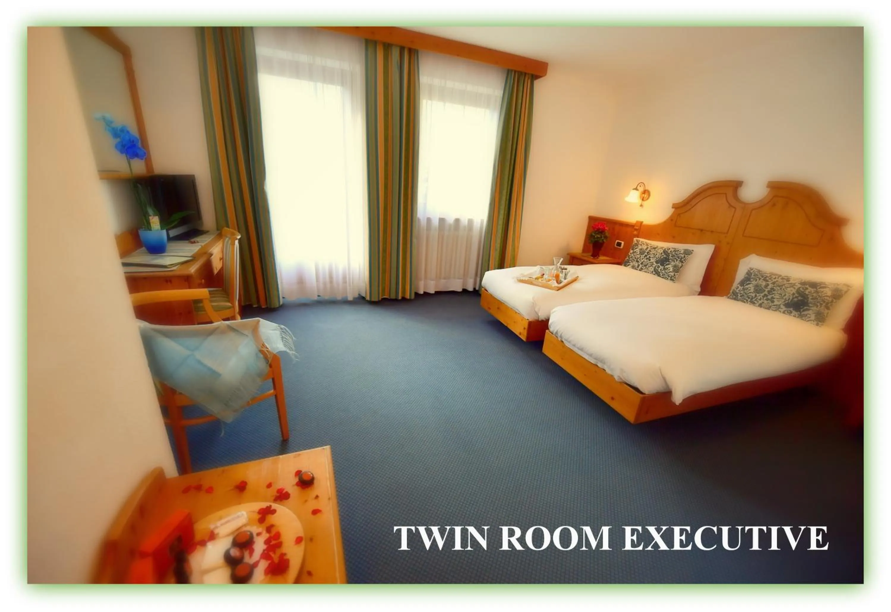 Bed in Hotel Beau Sejour