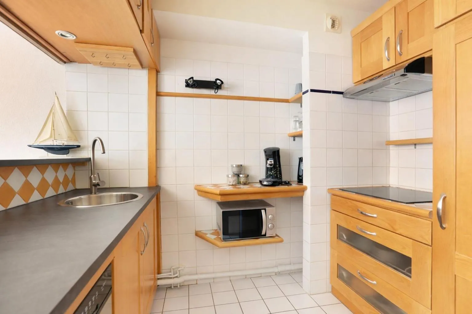Kitchen or kitchenette in Les Lilas Serviced Apartments